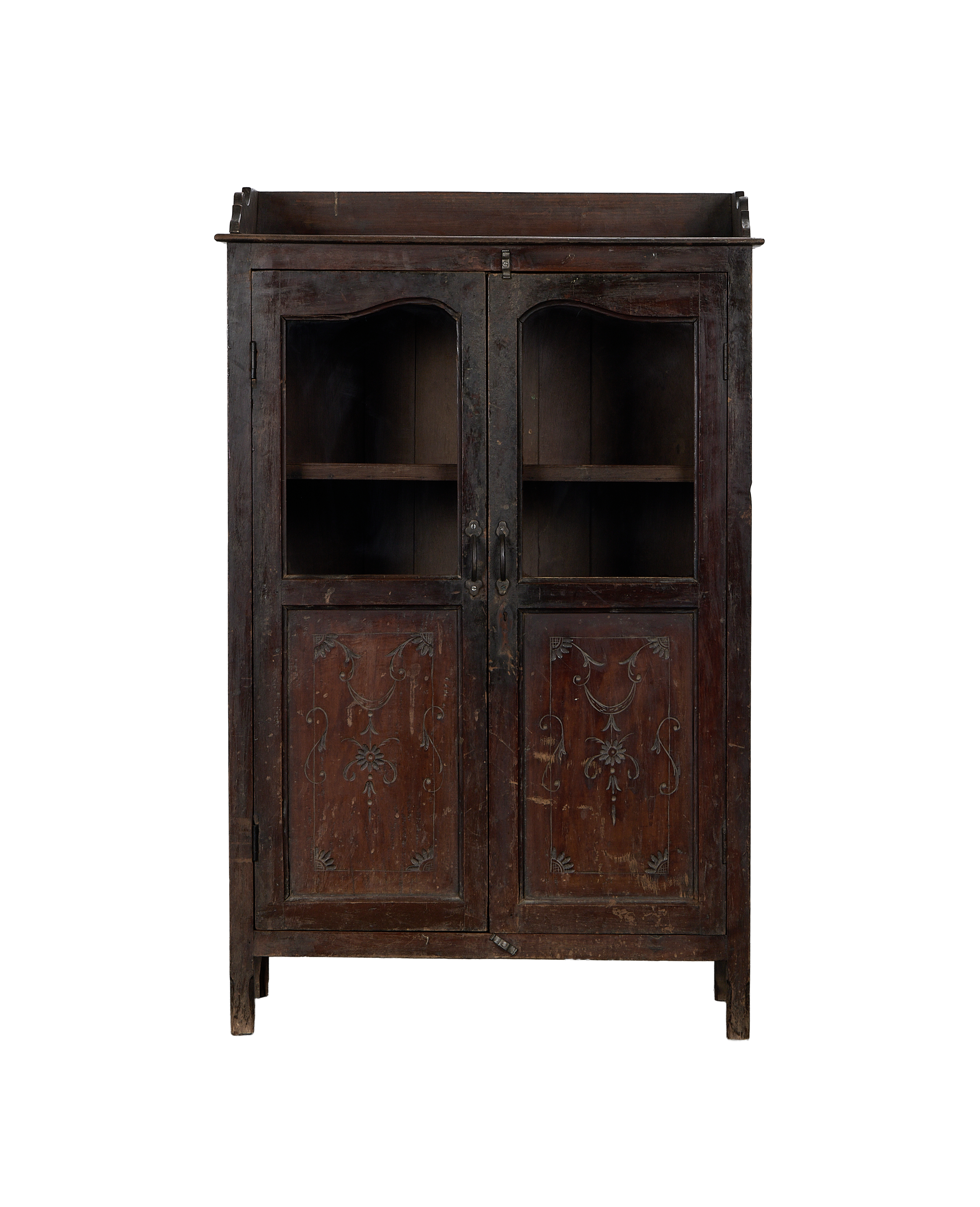 Vintage Indian oak cabinet, distressed brown finish, glass-paned doors with carved floral panels.