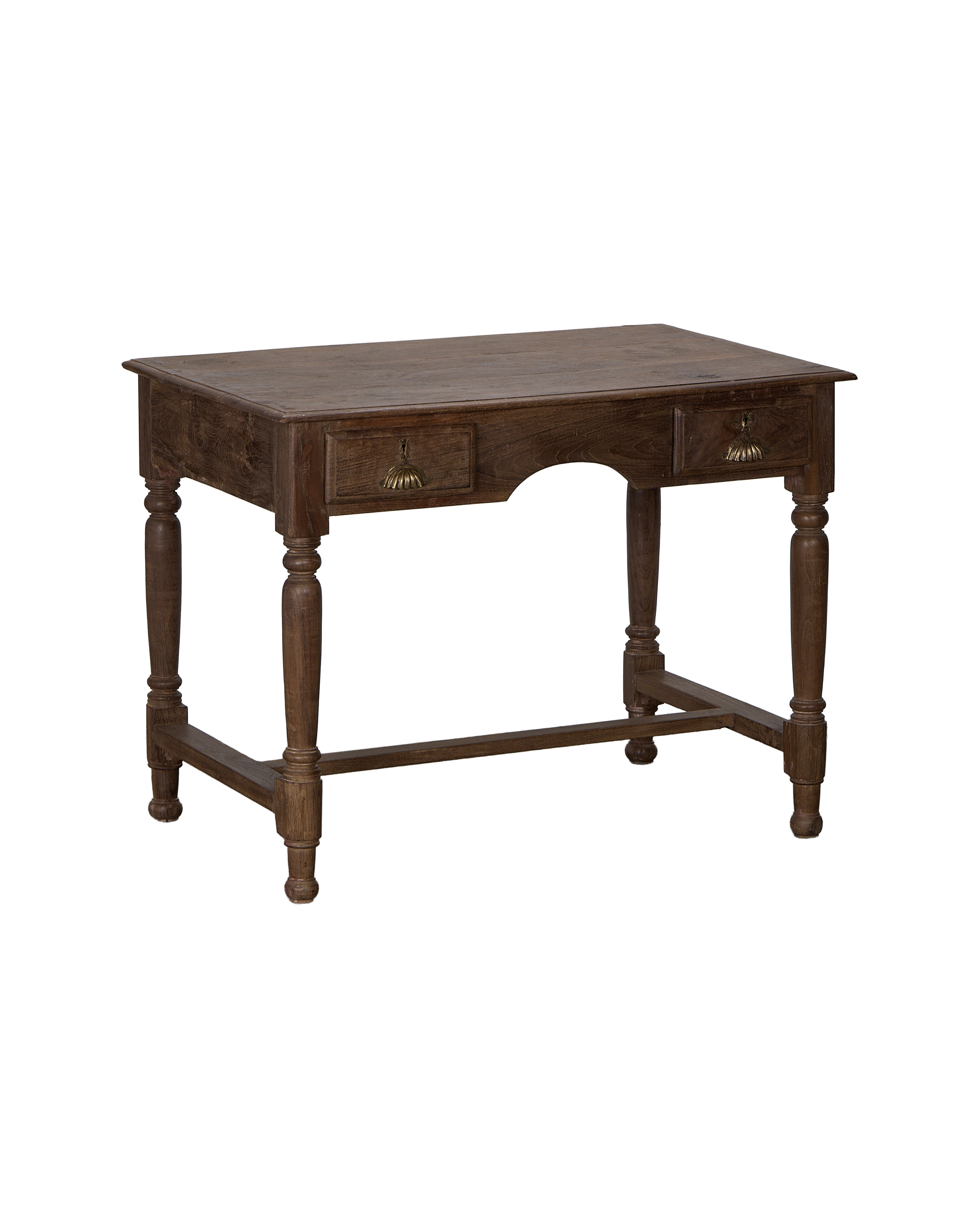 Vintage natural oak writing desk from India, showing ornate drawer pulls and turned legs.