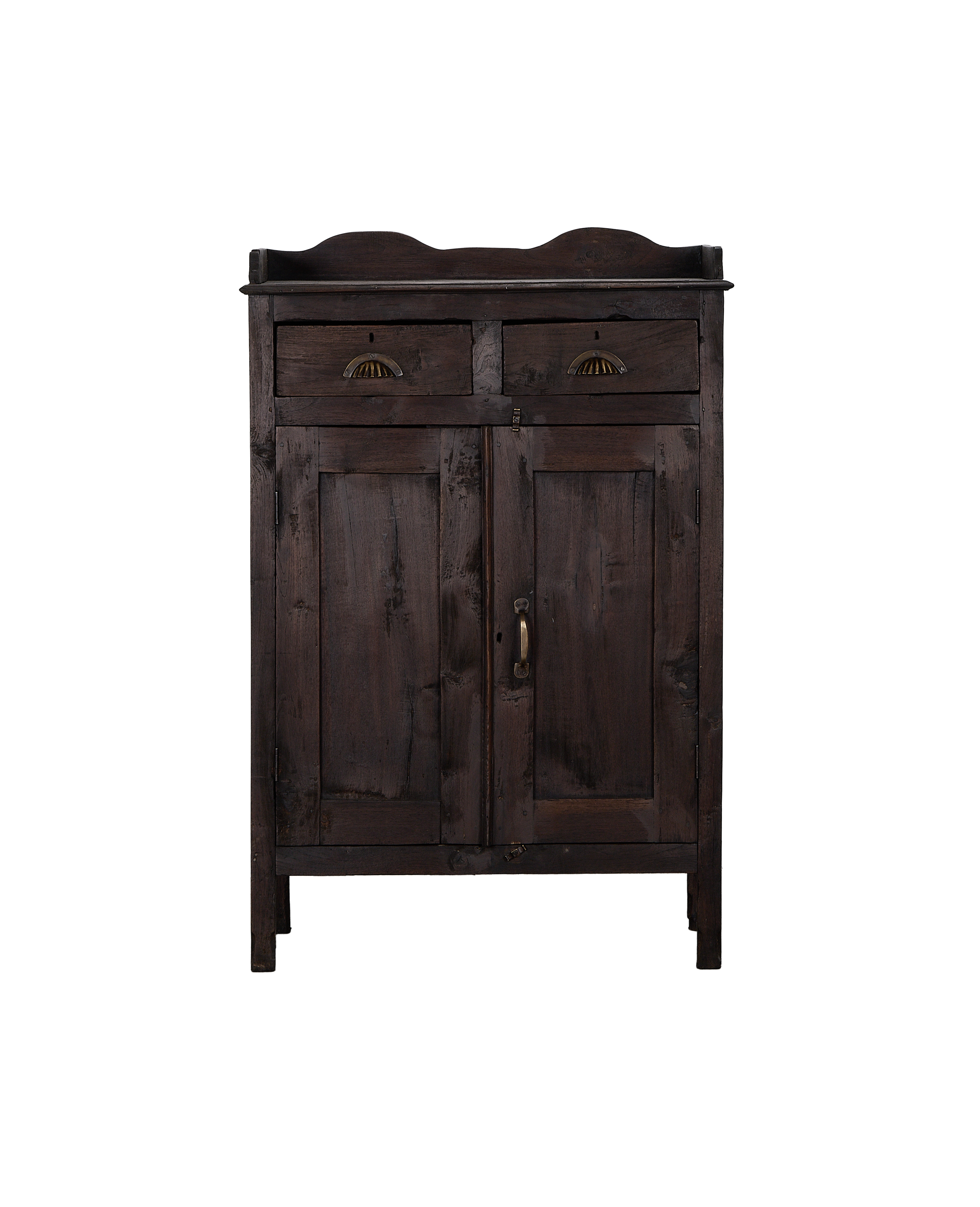 Vintage dark stained oak cabinet from India, featuring two drawers with brass pulls and double doors.