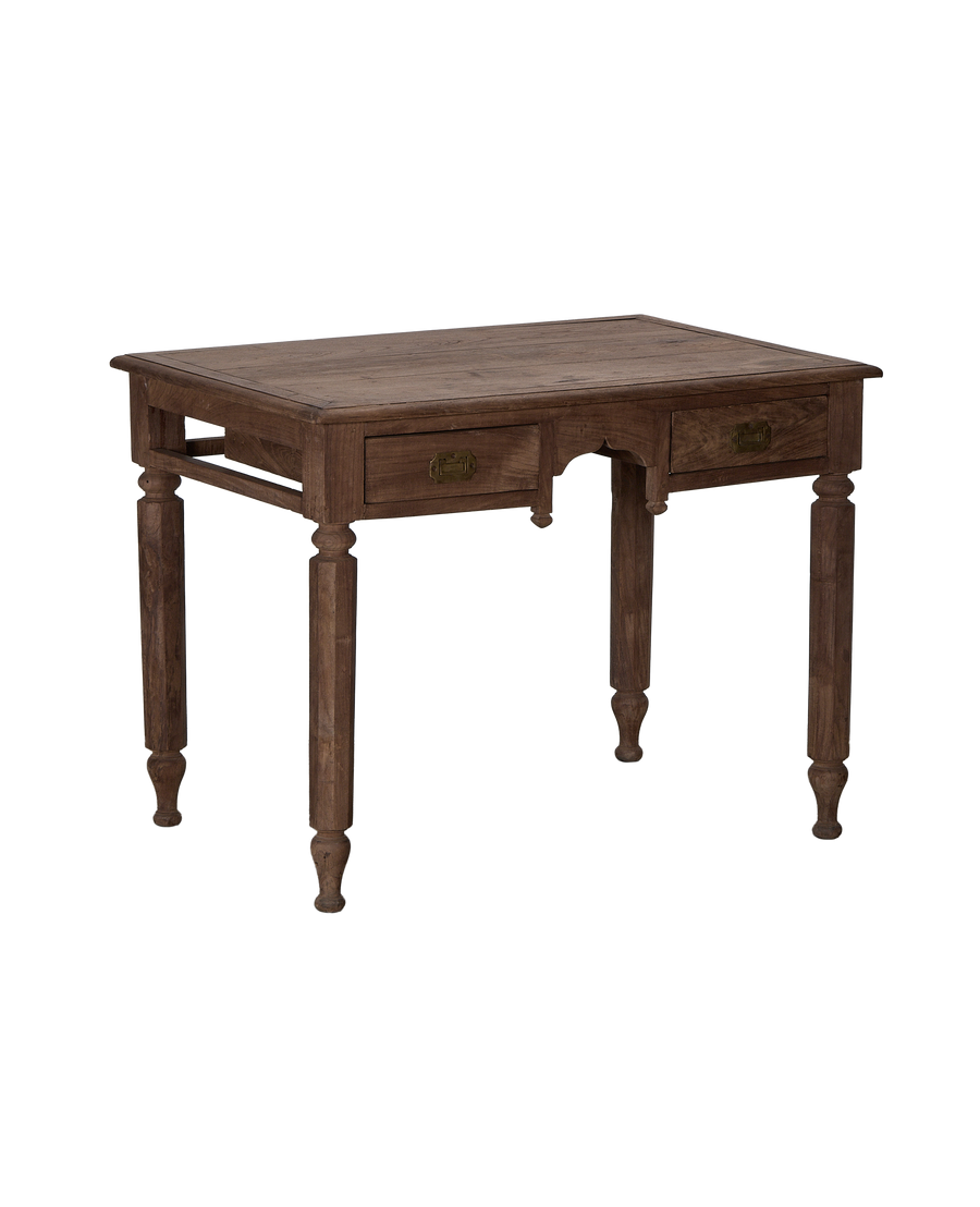 Vintage Indian oak wood desk, angled view, showing two drawers with brass pulls.
