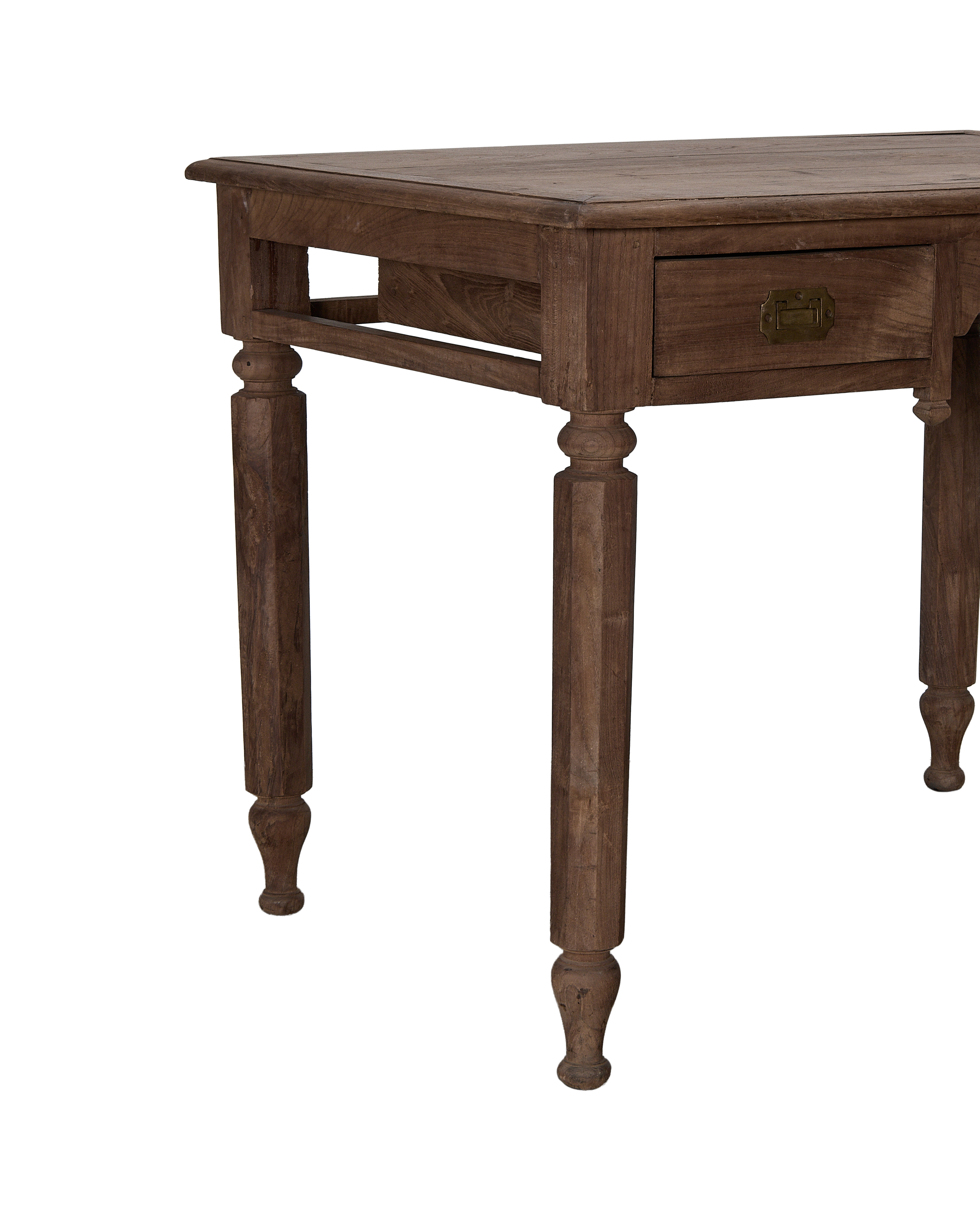Vintage Indian oak desk, showing side drawer with brass pull and carved turned legs.