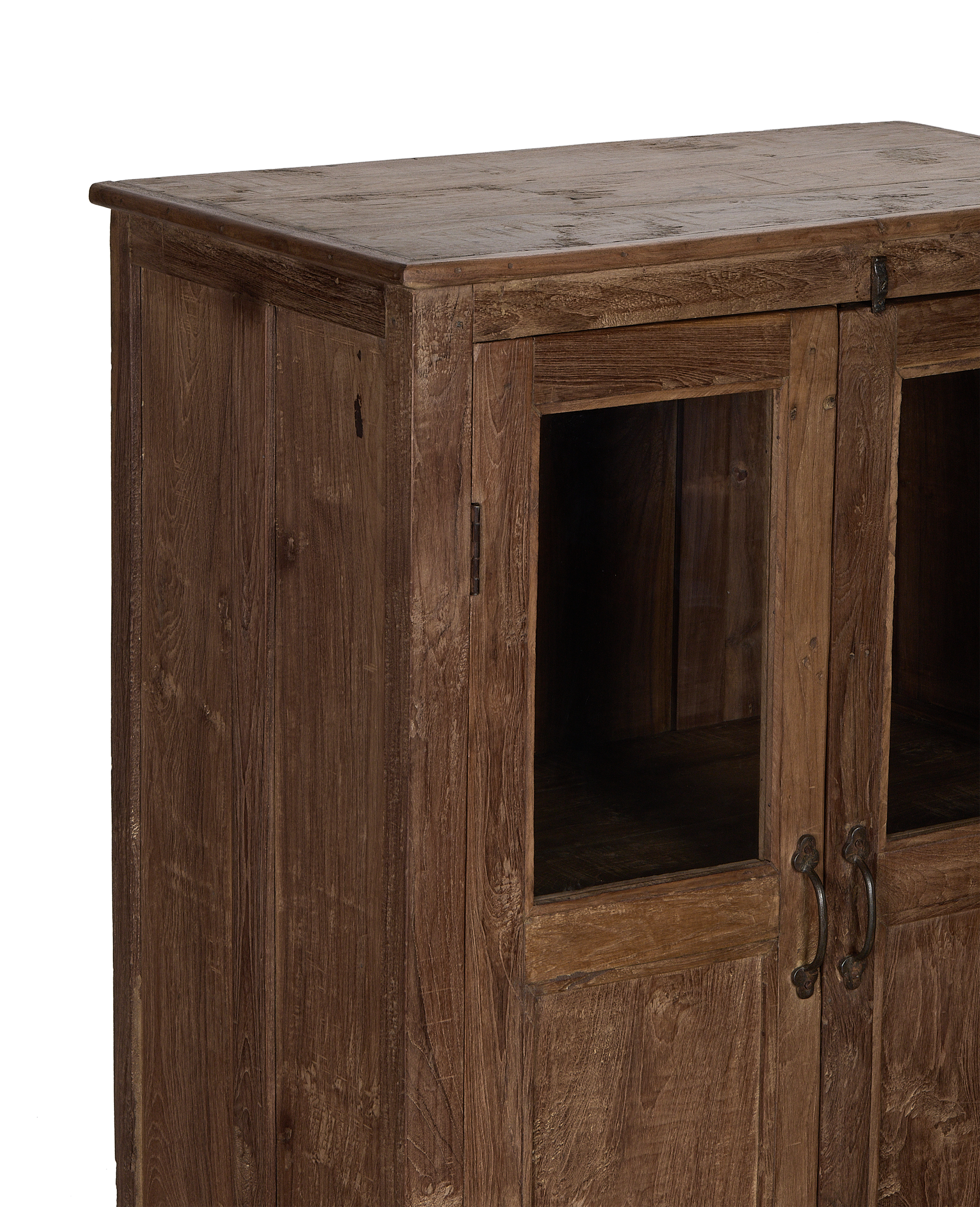 Close-up of vintage Indian oak wood cabinet's natural grain and distressed finish.