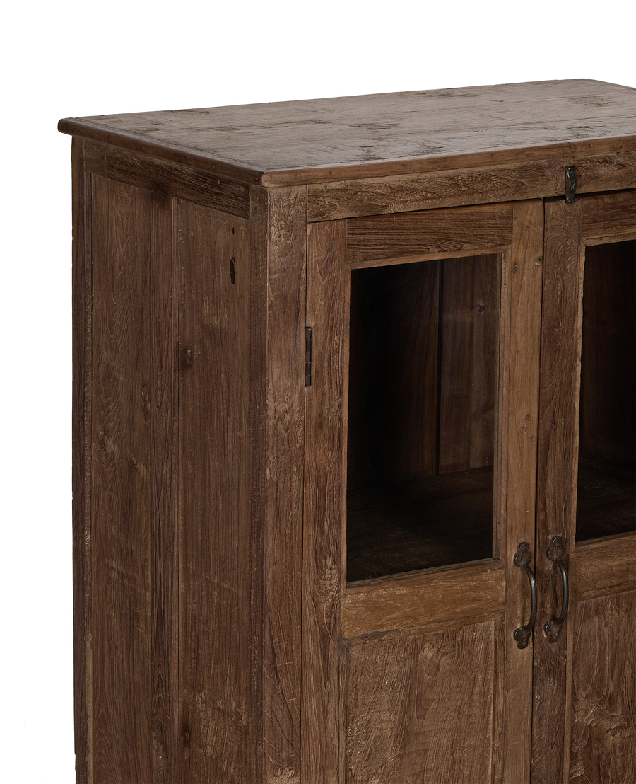Close-up of vintage Indian oak wood cabinet's natural grain and distressed finish.