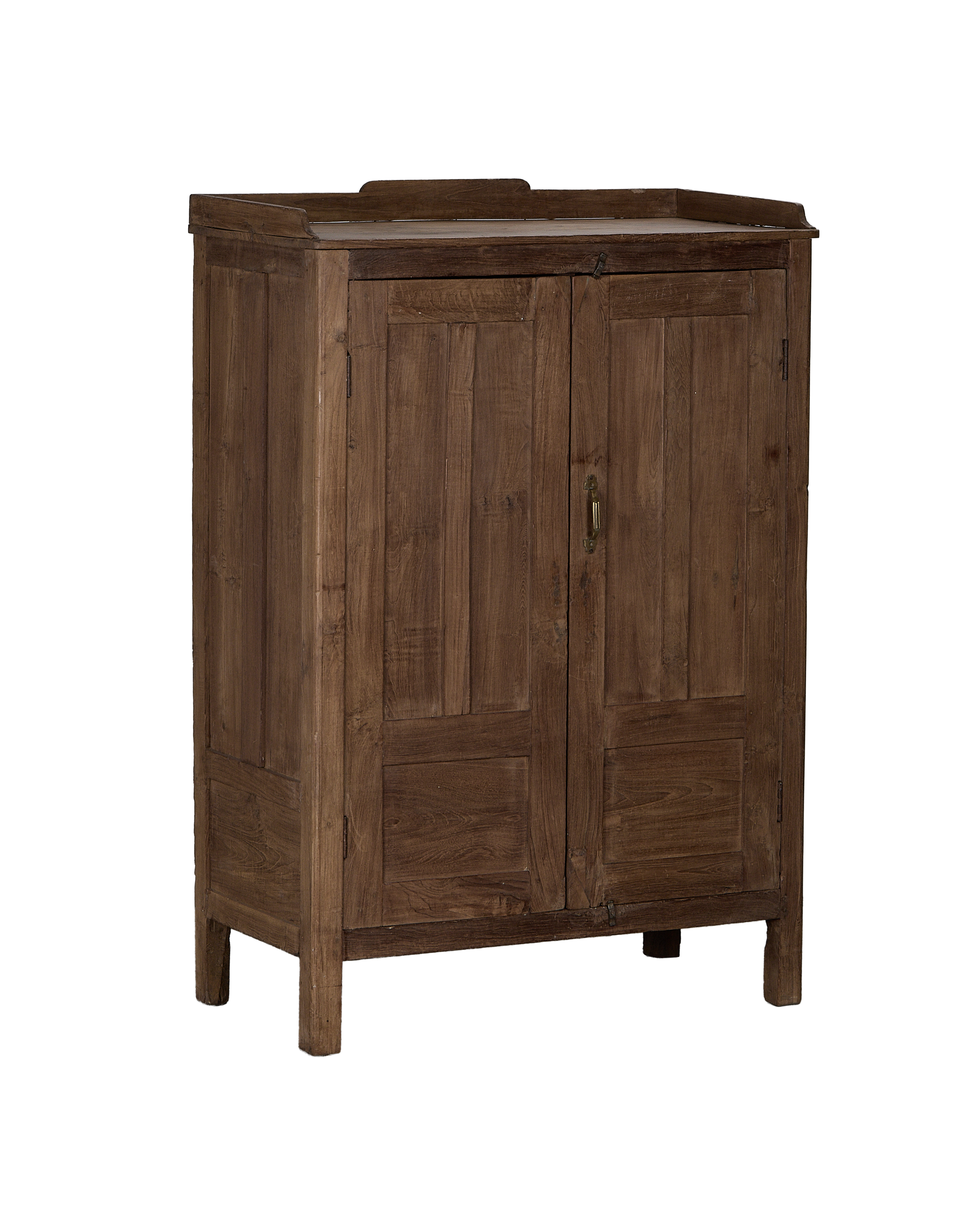 Vintage dark oak cabinet from India, showing paneled doors and brass hardware.