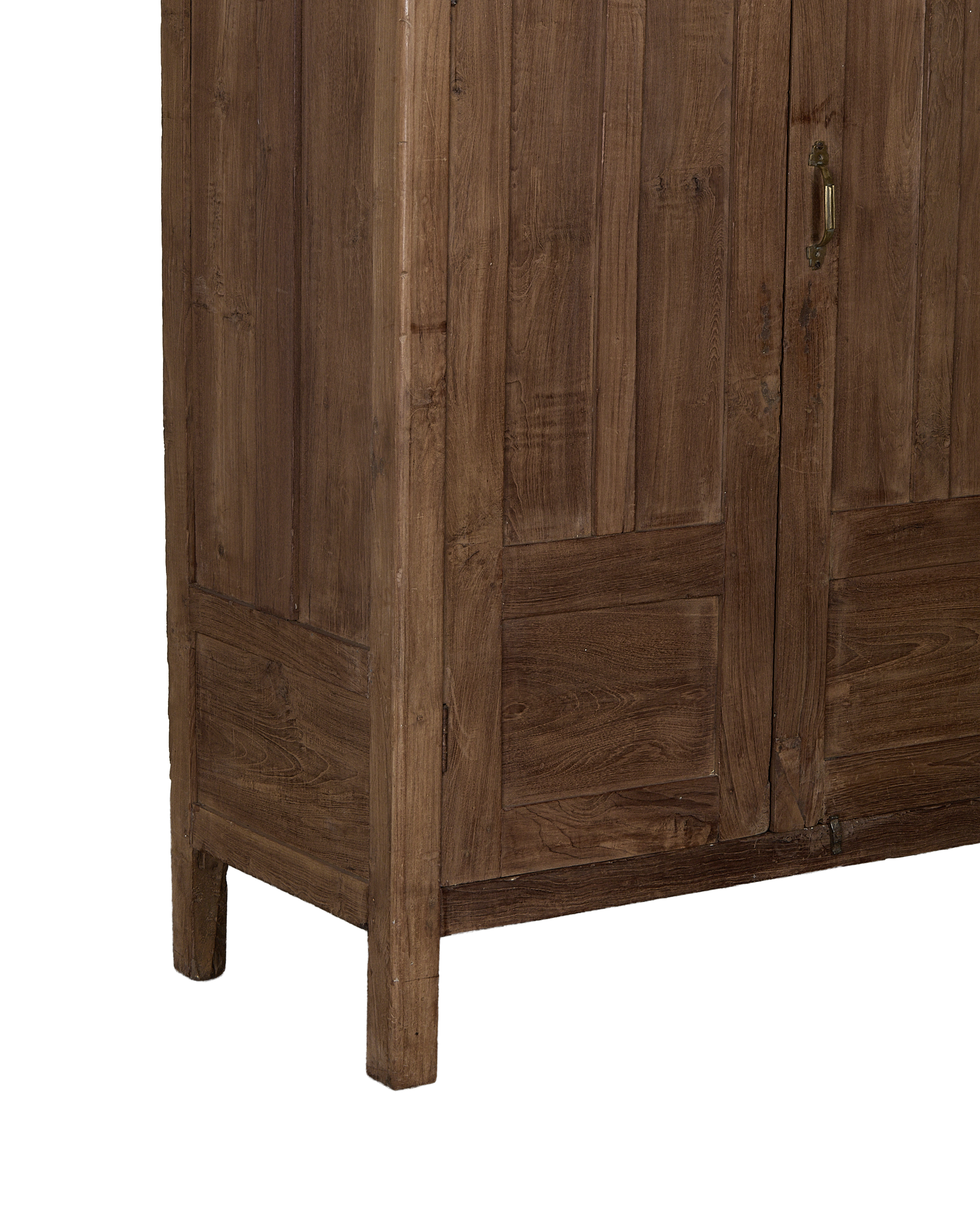 Vintage Indian oak cabinet, showing cabinet doors and a foot, natural wood grain.