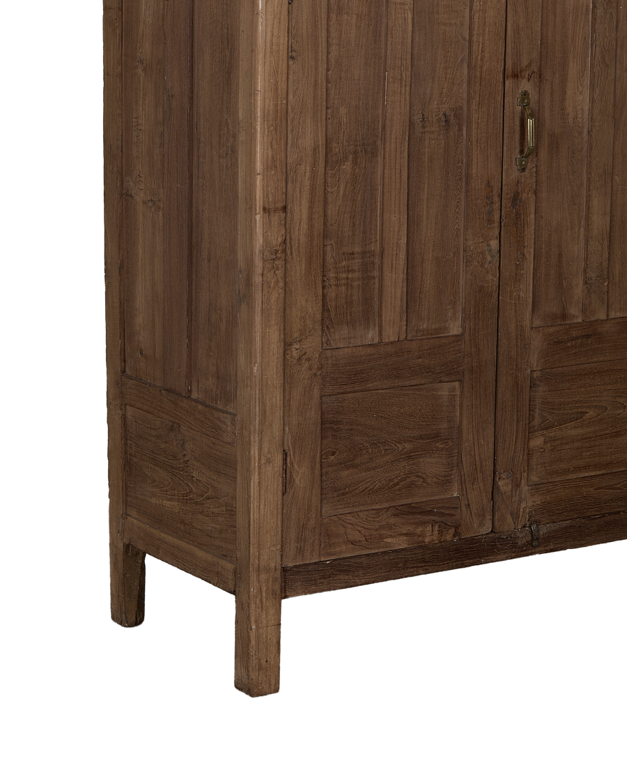 Vintage Indian oak cabinet, showing cabinet doors and a foot, natural wood grain.