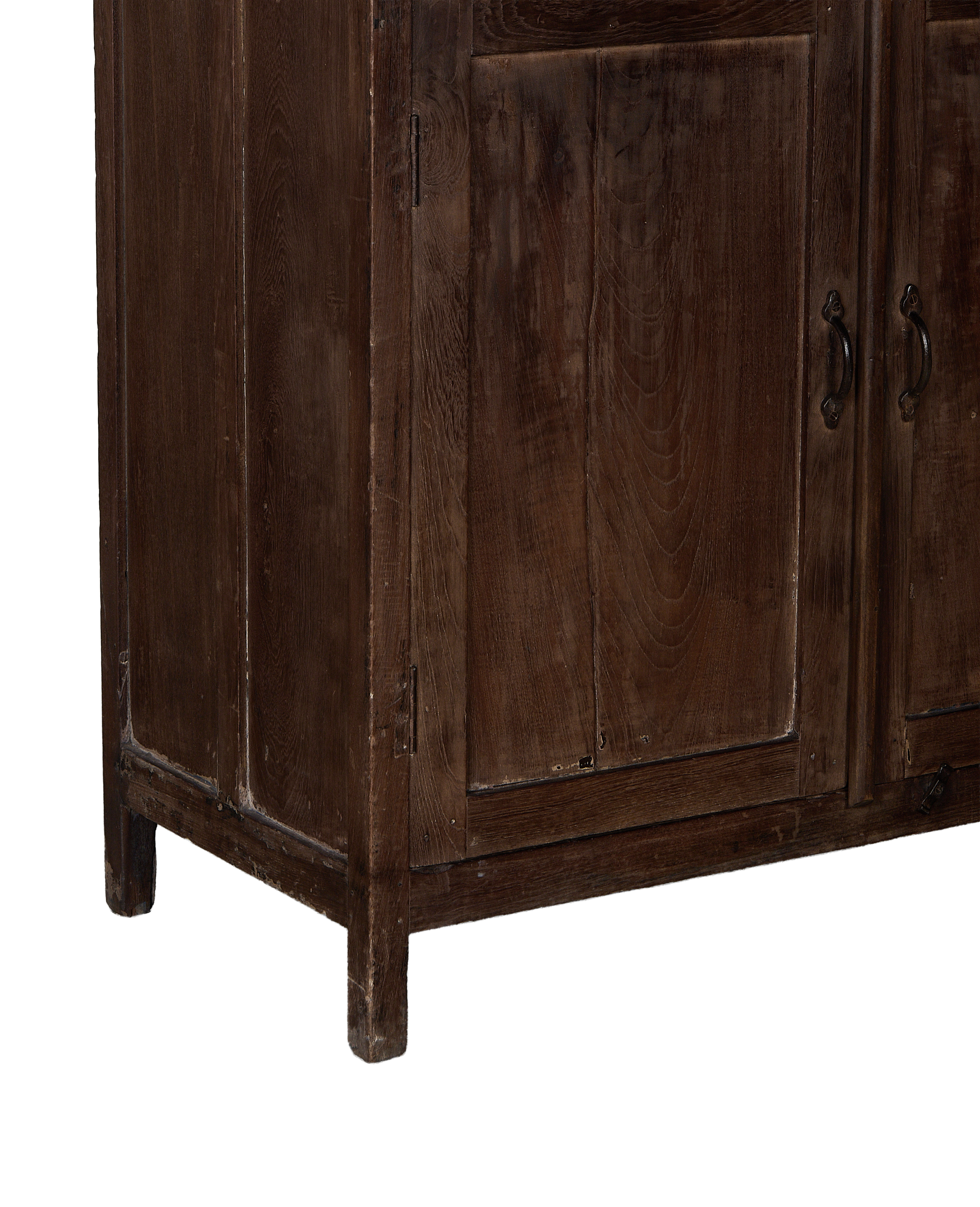 Vintage Indian oak cabinet bottom showing sturdy construction, dark wood grain, and aged patina.