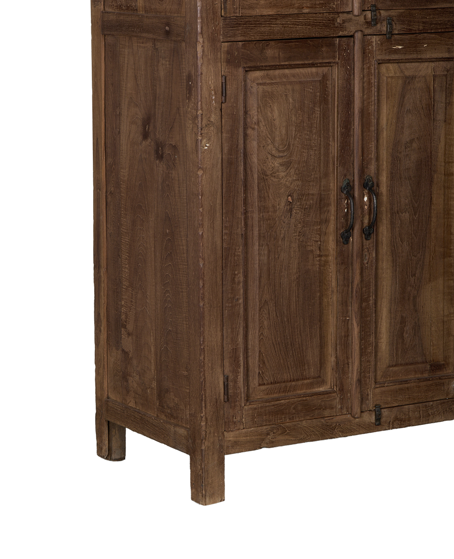 Vintage Indian oak cabinet details: distressed wood finish, sturdy construction, showing lower right corner and feet.