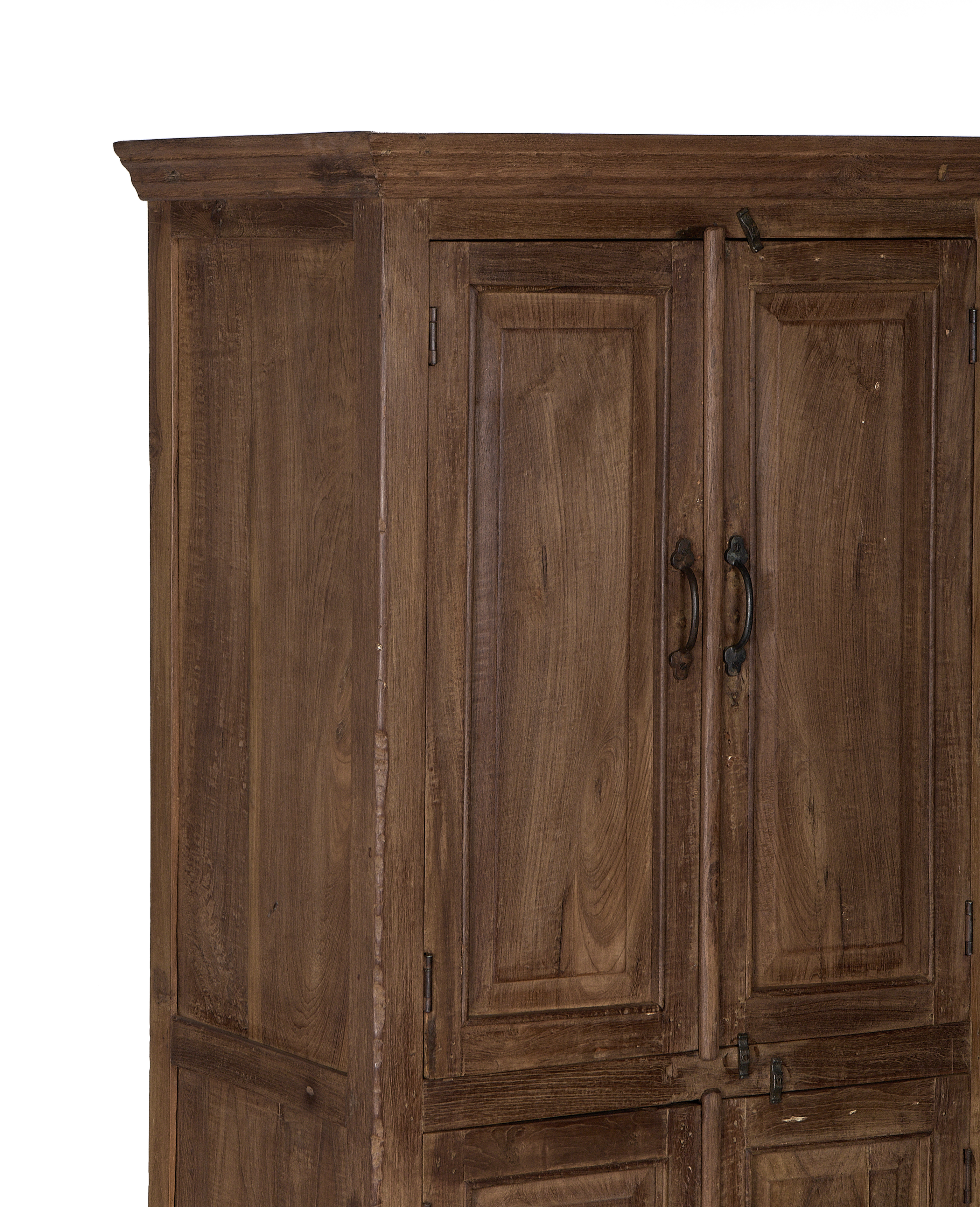 Vintage Indian oak cabinet details, showing natural wood grain, dark handles, and top cornice.