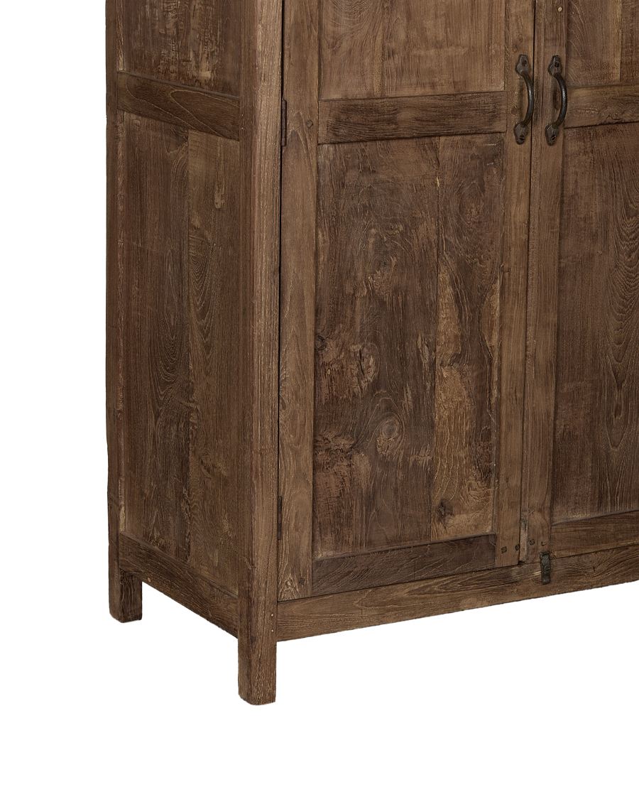 Vintage Indian oak cabinet: close-up showing the rustic wood grain texture and bottom feet.