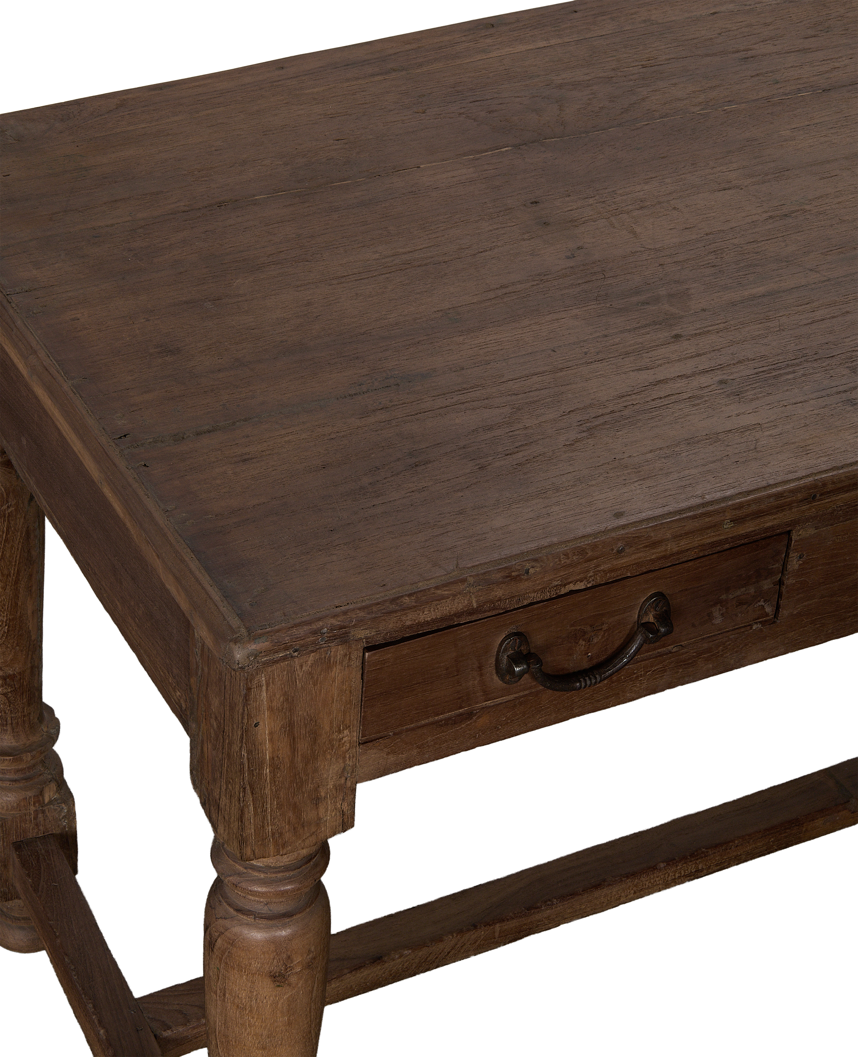 Vintage Indian oak wood desk, close-up of drawer with antique metal handle.