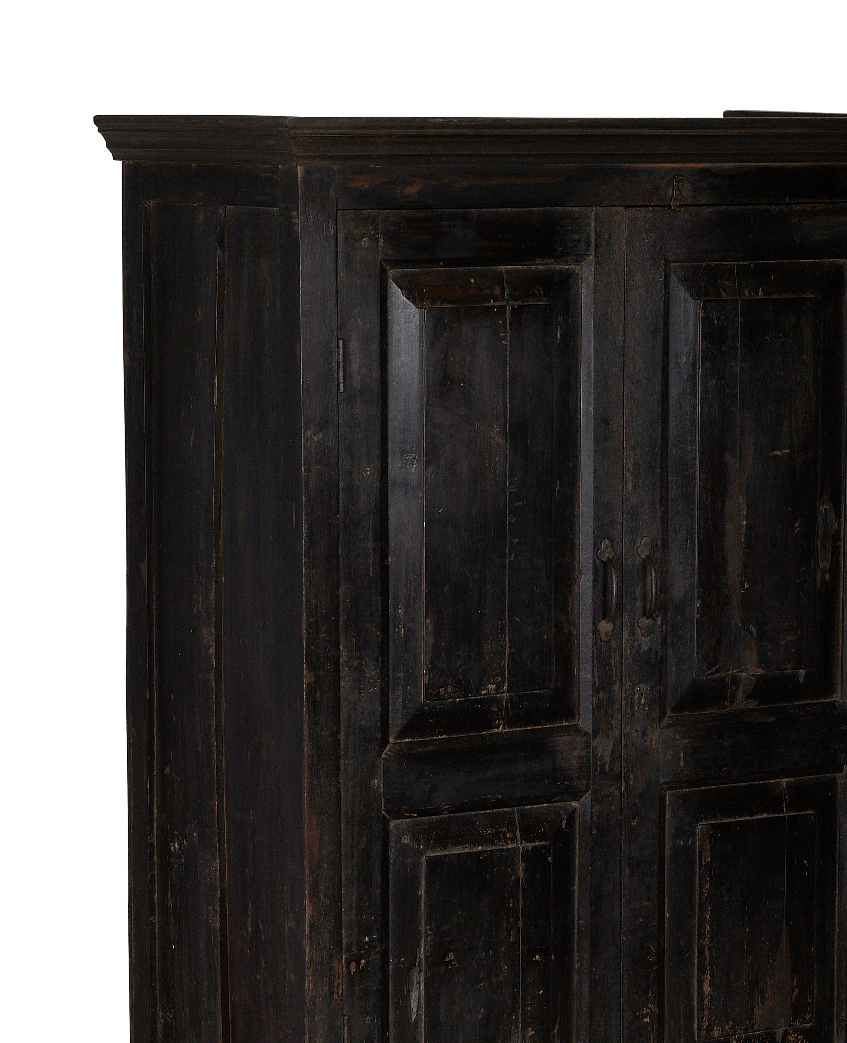 Vintage Indian oak wood cabinet, showing one door and top trim detail.