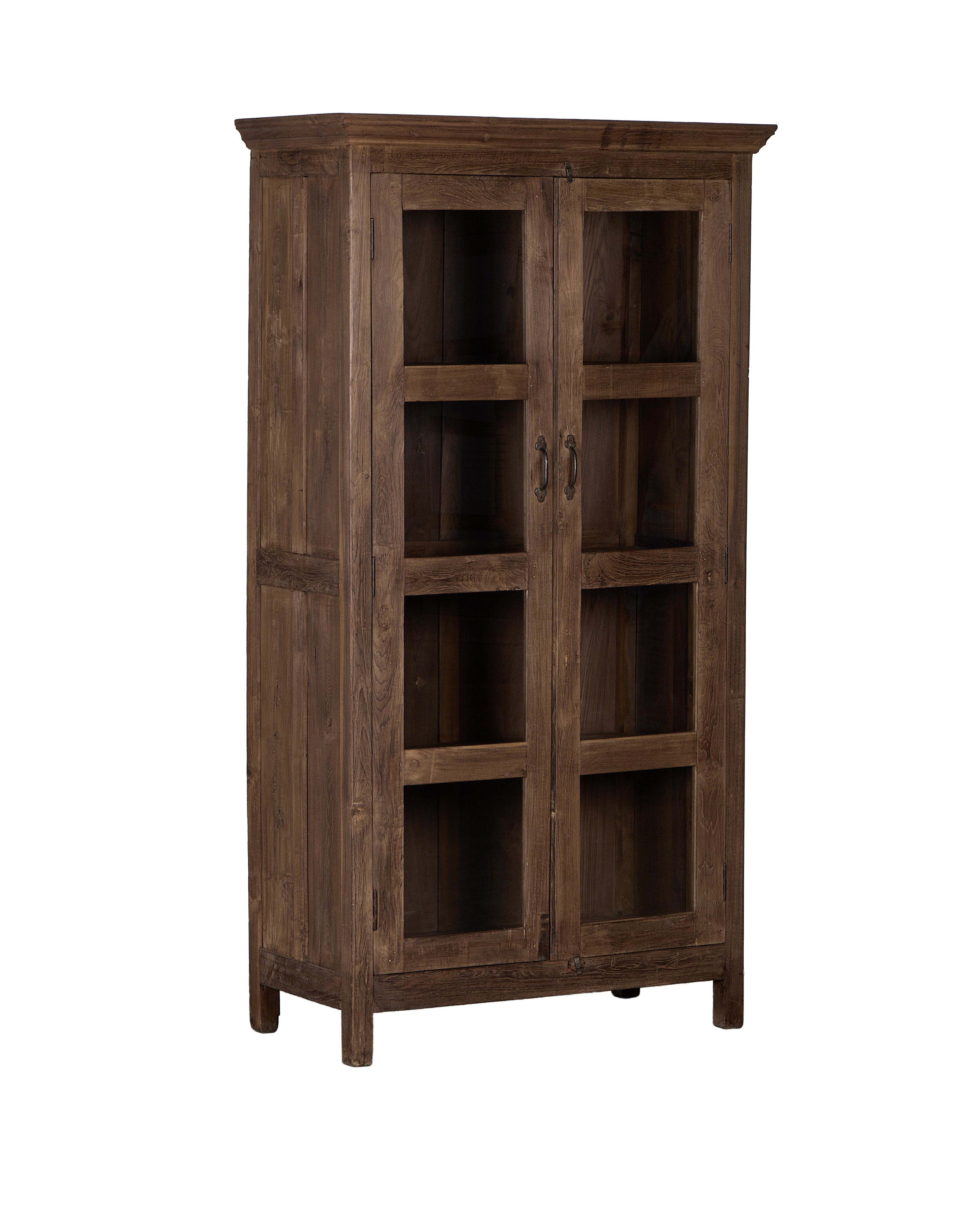 Vintage Indian oak cabinet from an angled front view, showcasing natural wood grain, glass doors, and dark handles.