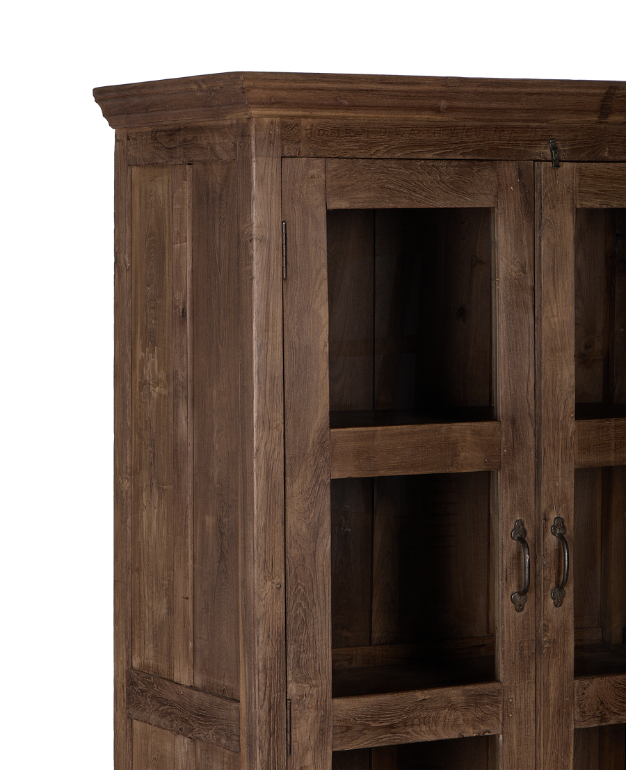 Vintage Indian oak cabinet details: weathered natural wood finish, glass doors, and dark metal handles.