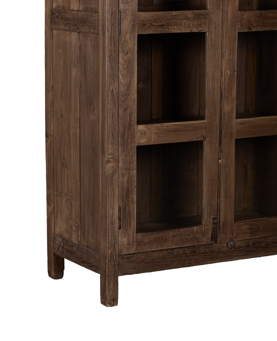 Vintage Indian oak wood cabinet, close-up of natural weathered texture and exposed joinery details.