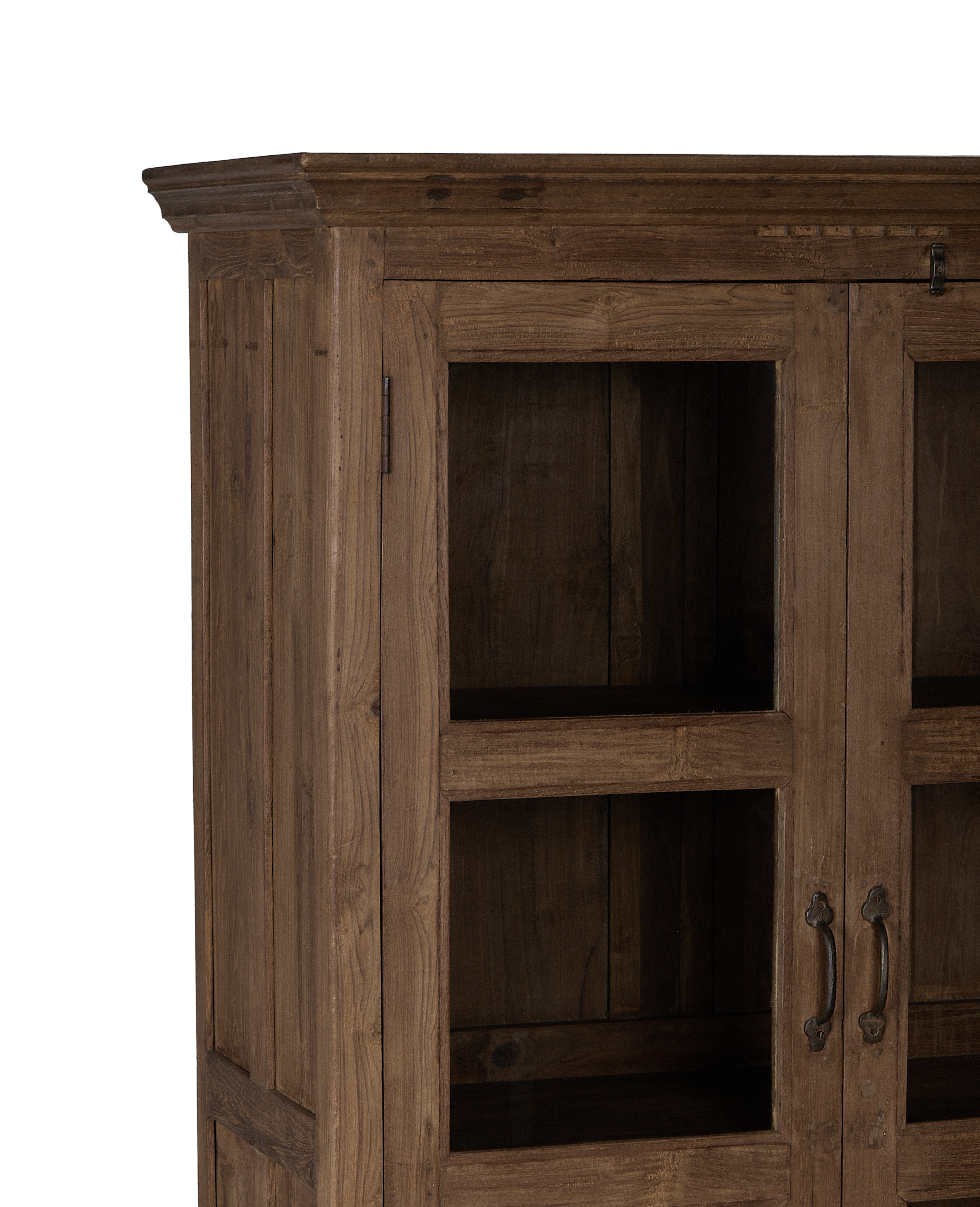 Vintage Indian oak wood cabinet, close-up of natural distressed wood grain and glass-paned doors.