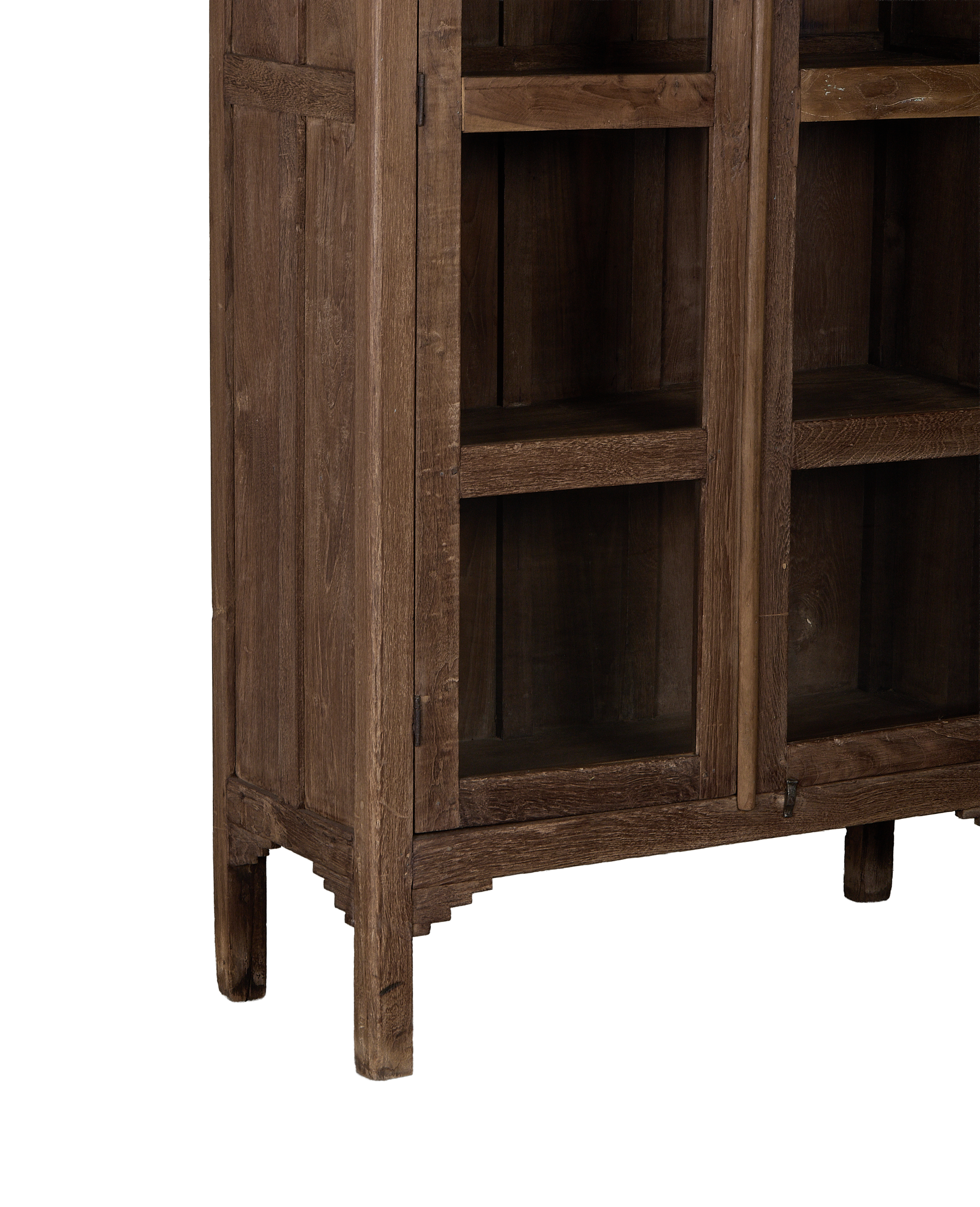 Vintage Indian oak cabinet: lower right details, including ornate stepped foot and glass-front door.