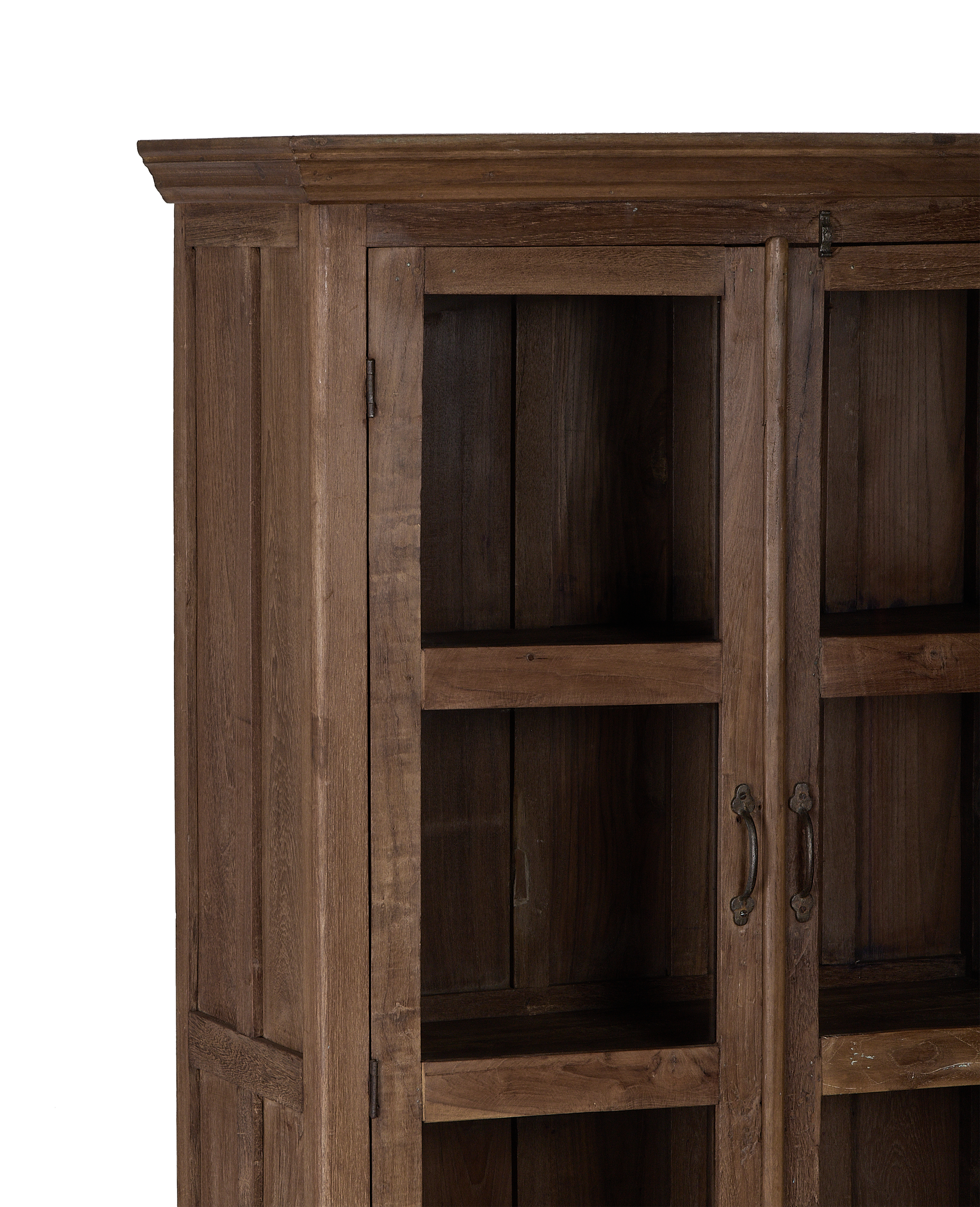 Vintage Indian oak wood cabinet, close-up of glass doors, shelves, and rustic handles.