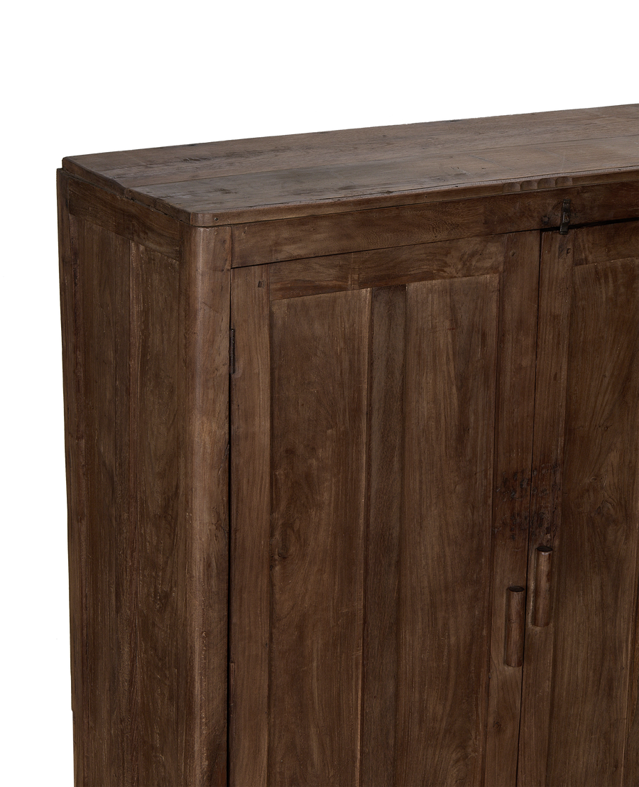 Close-up of the vintage Indian oak wood cabinet's natural grain and distressed finish.
