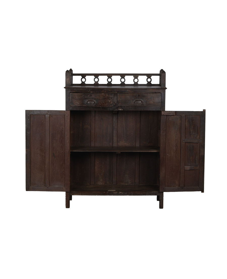 Vintage Indian oak cabinet, doors open revealing internal shelving and drawers.