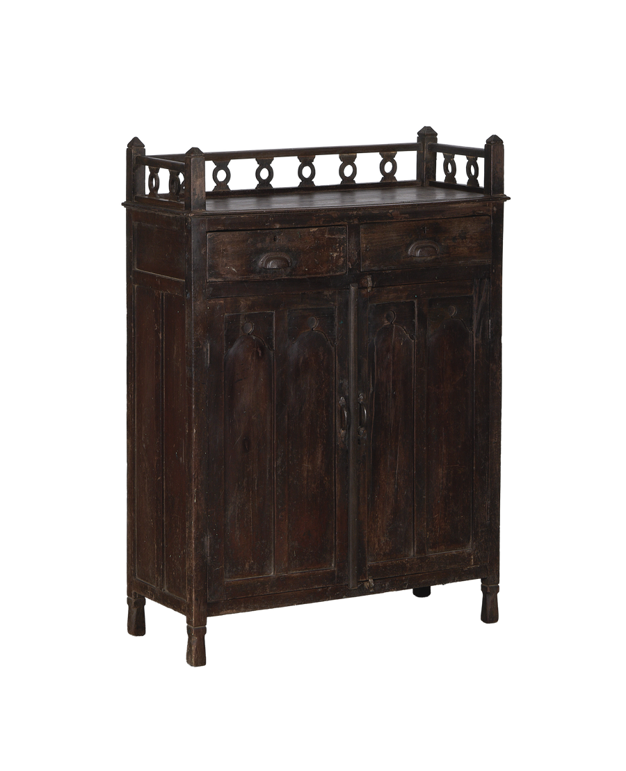 Vintage Indian oak cabinet, full frontal view, showing openwork top gallery and two drawers.