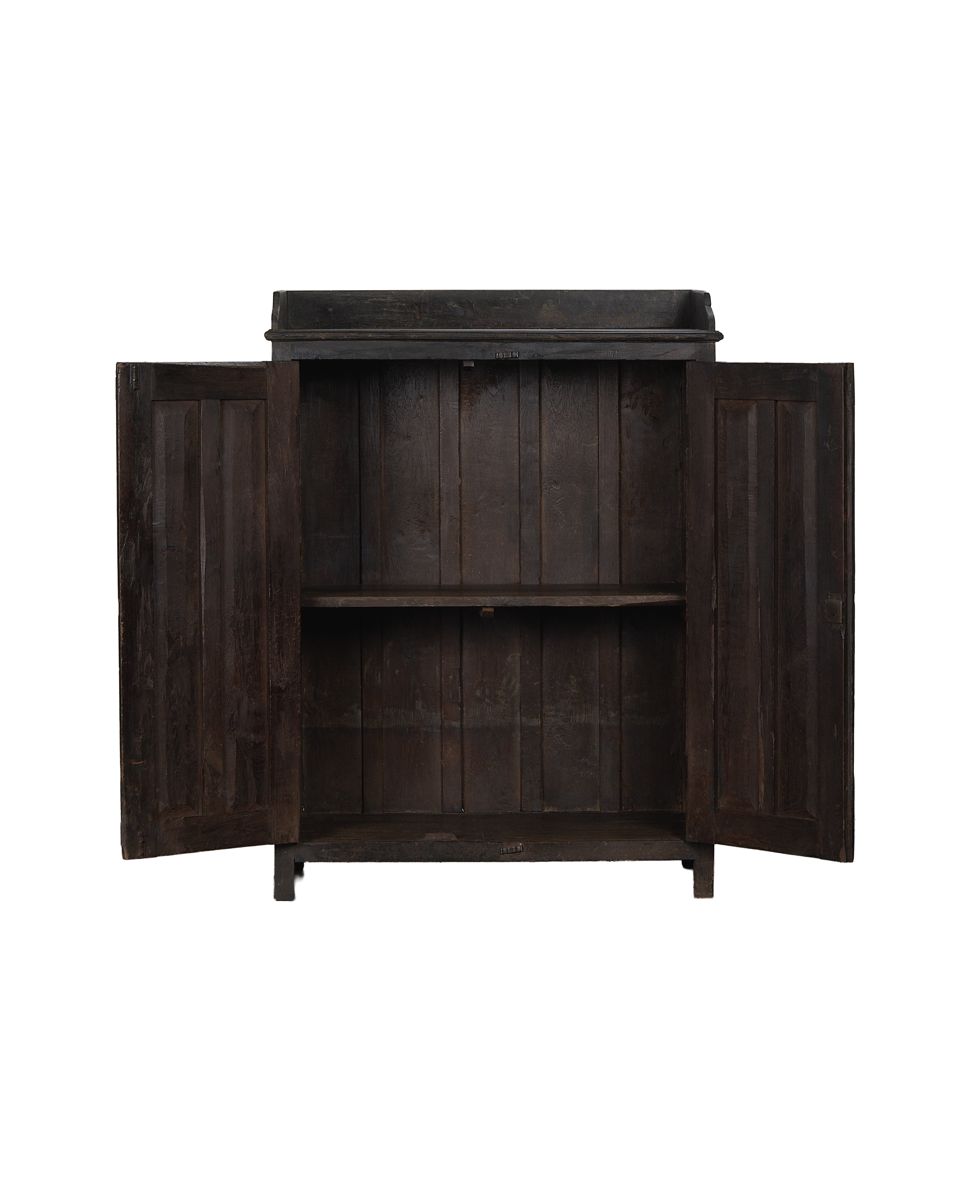 Open doors on vintage Indian stained oak cabinet, revealing interior shelves and aged wood.