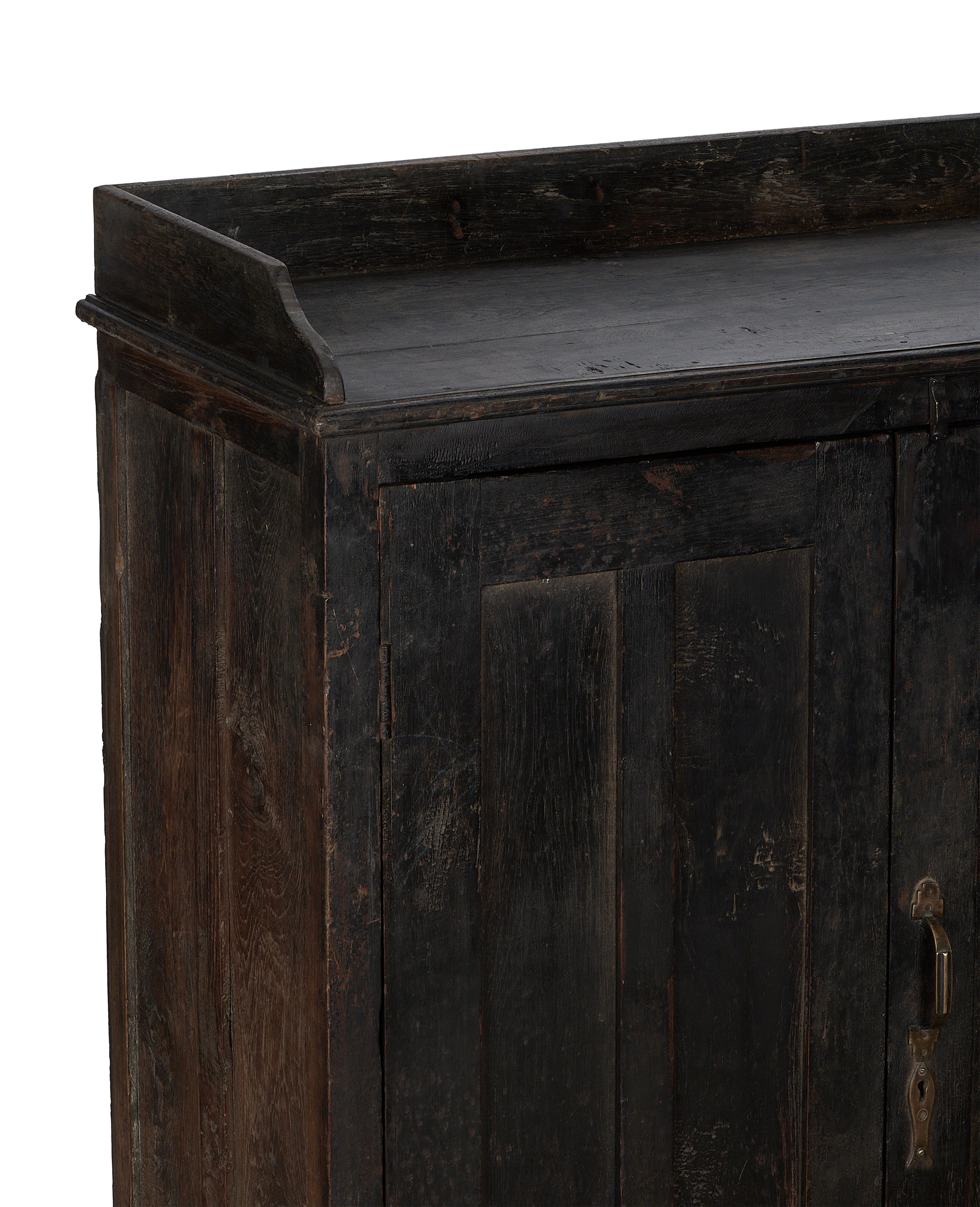 Vintage Indian oak cabinet details, showing distressed dark wood grain and top molding.