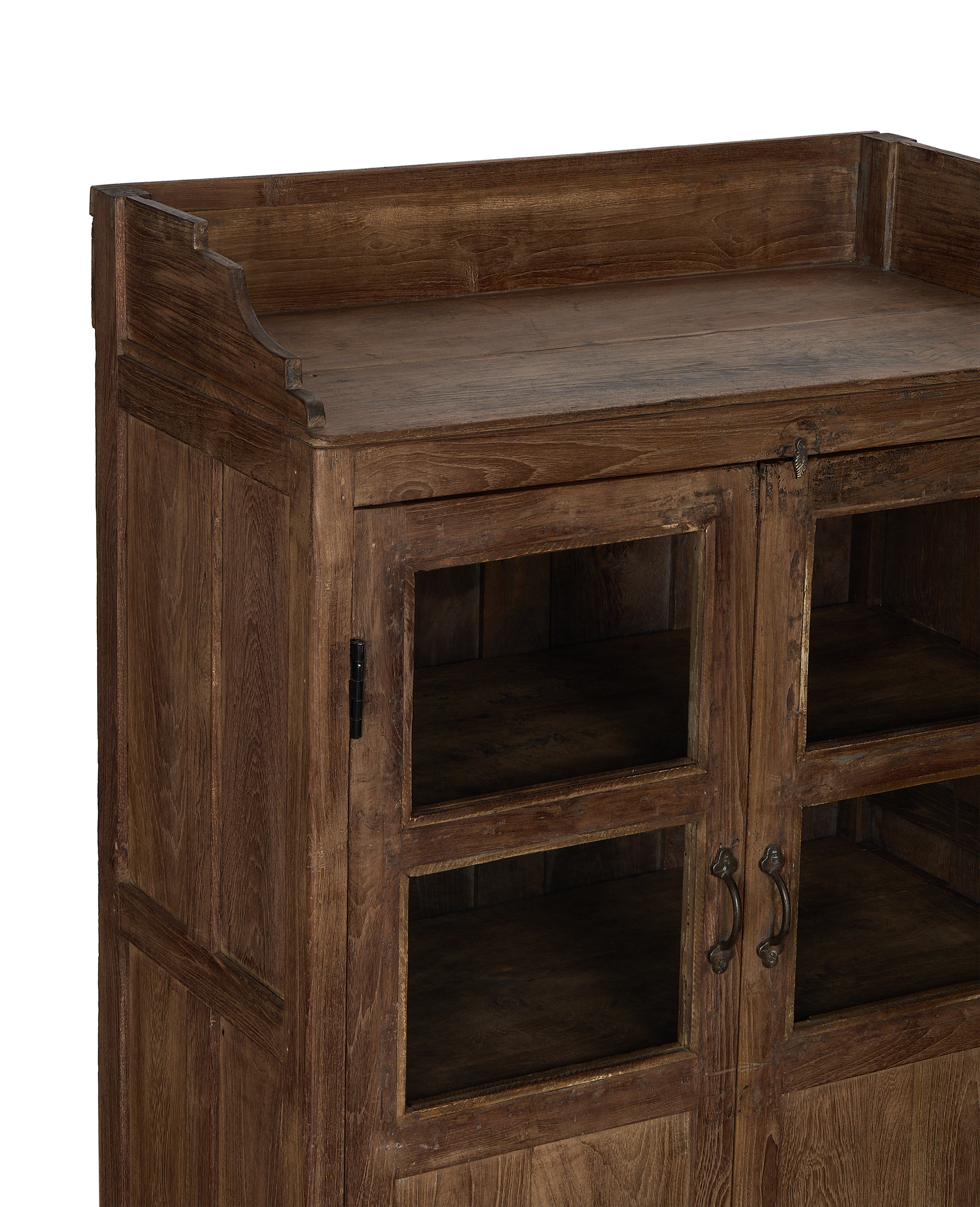 Vintage Indian oak cabinet details, showing glass doors, antique hardware, and natural wood texture.