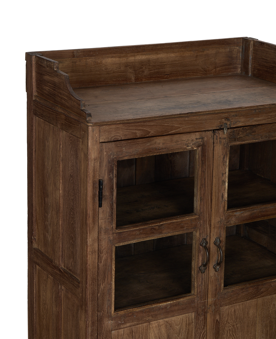 Vintage Indian oak cabinet details, showing glass doors, antique hardware, and natural wood texture.