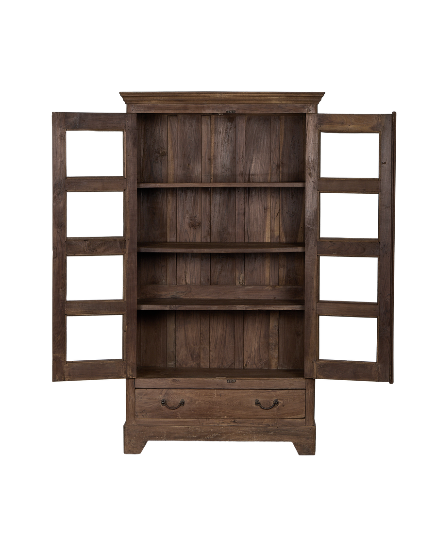 Open vintage Indian oak cabinet showing empty internal shelves and bottom drawer.