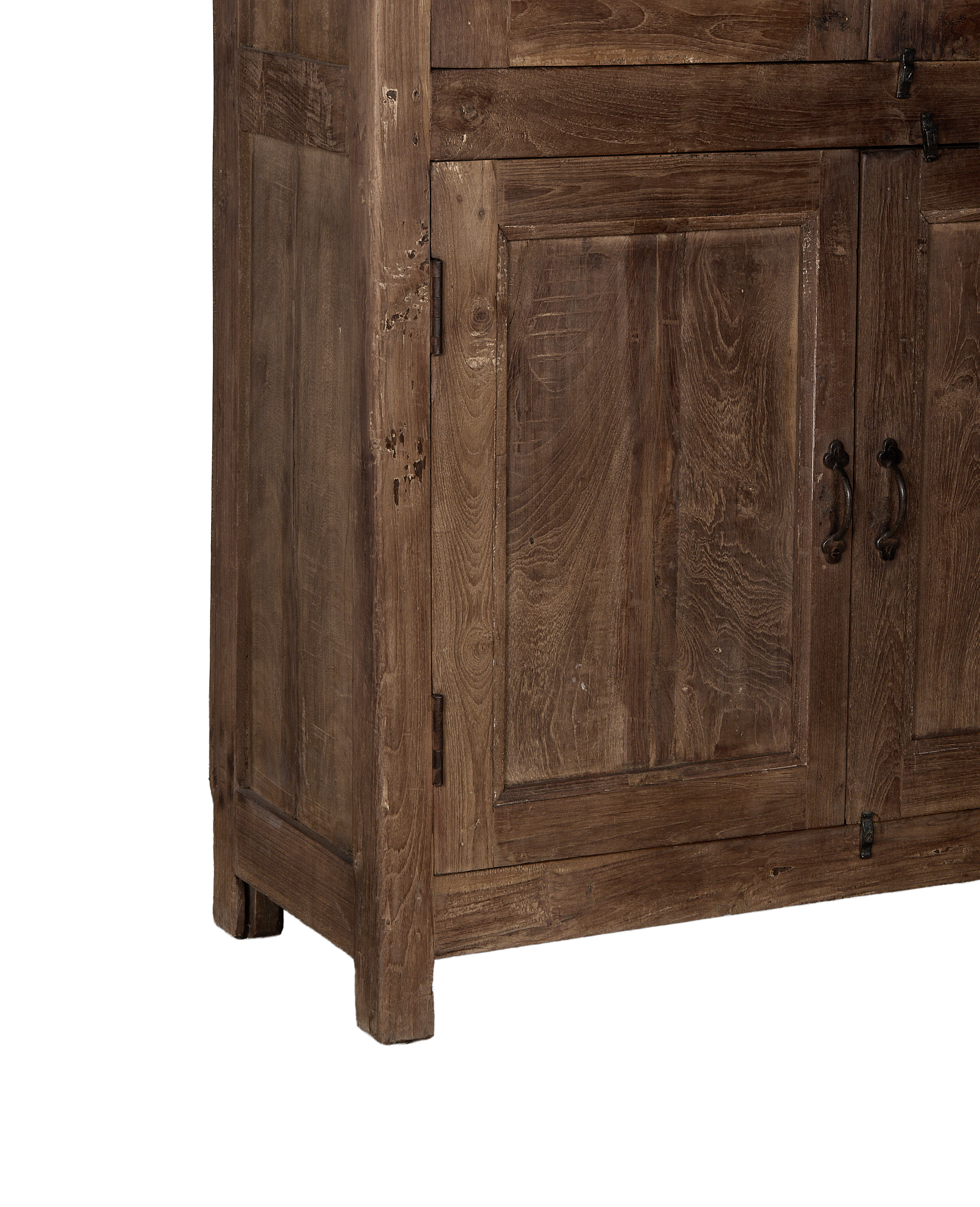 Vintage Indian oak wood cabinet, close-up of distressed rustic wood paneling and antique hinges.