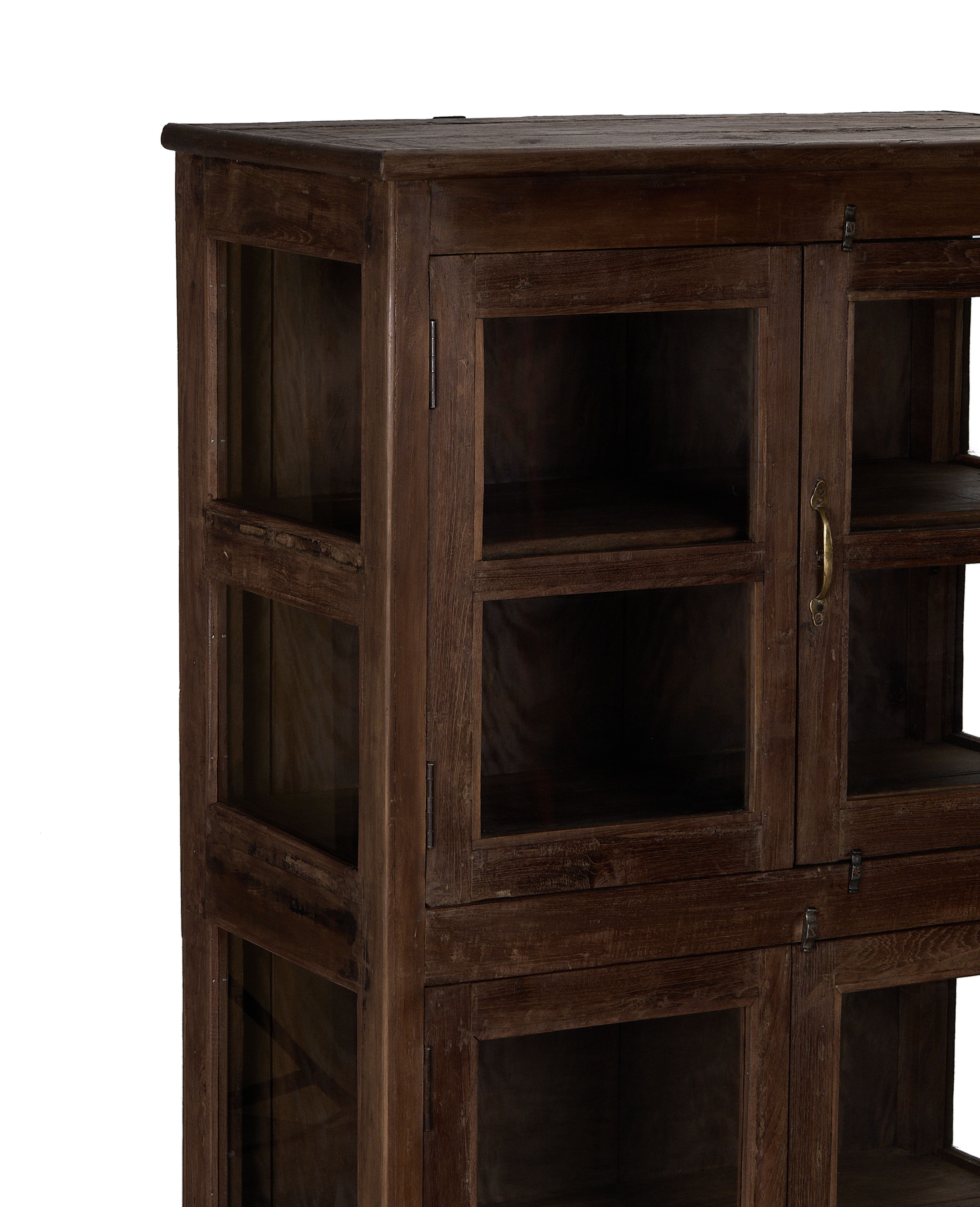 Close-up showing the rustic patina and rich grain of the vintage oak wood cabinet.