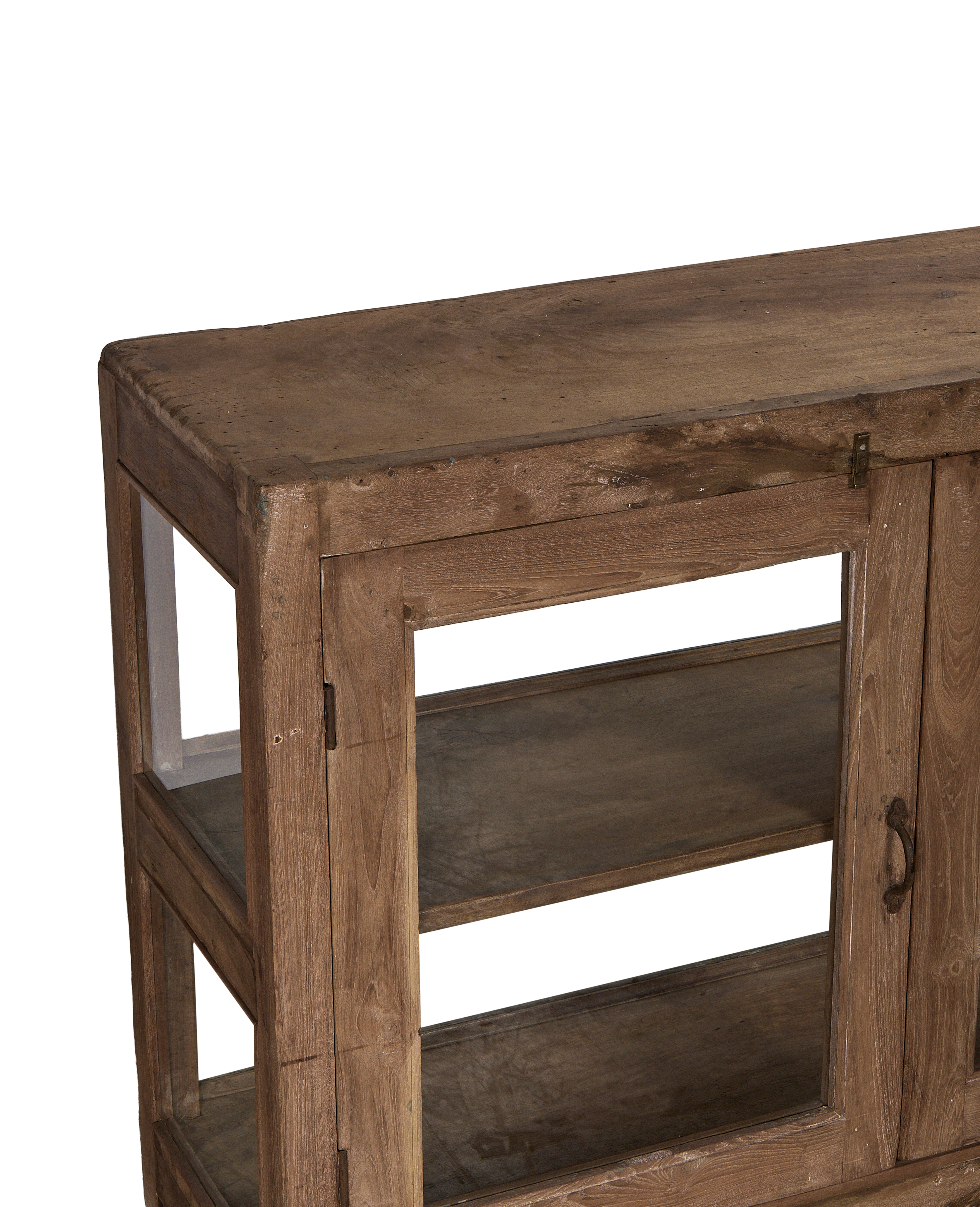 Close-up of vintage Indian oak sideboard's worn natural top, showing rustic texture and patina.