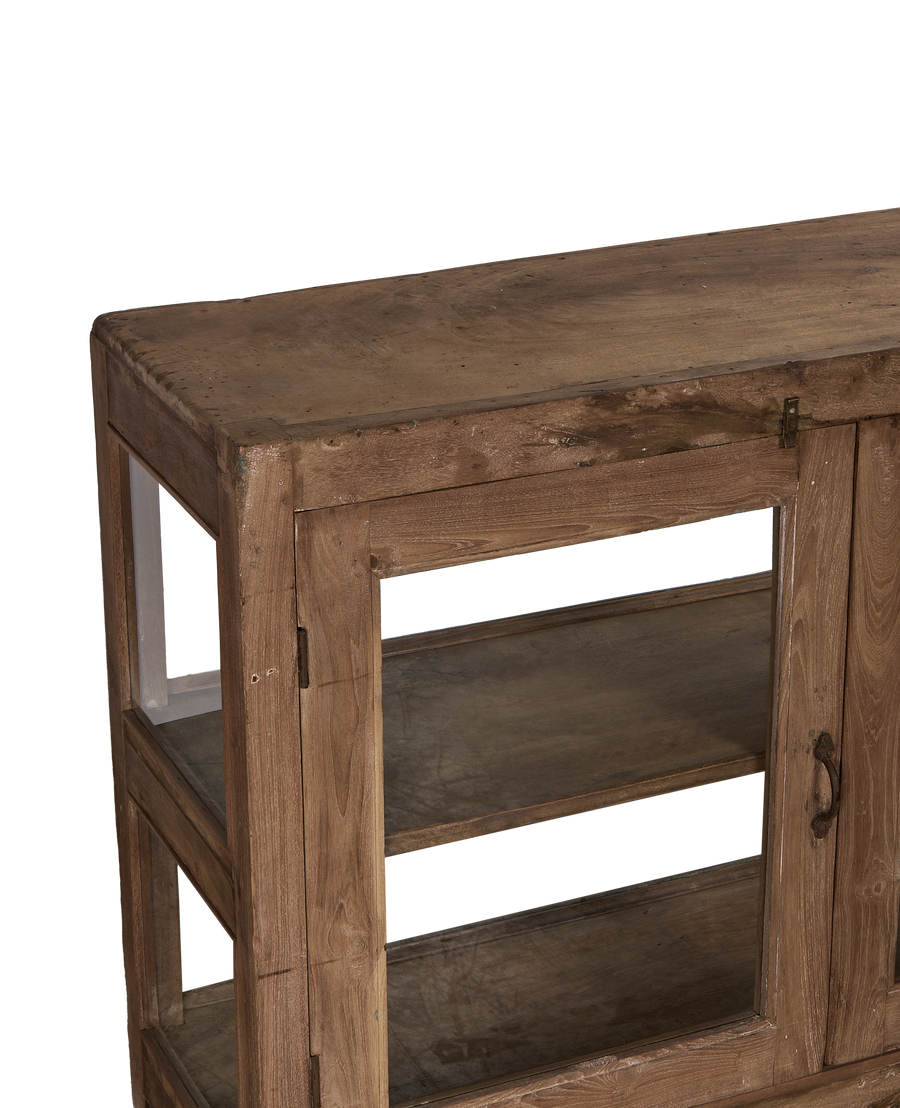Close-up of vintage Indian oak sideboard's worn natural top, showing rustic texture and patina.