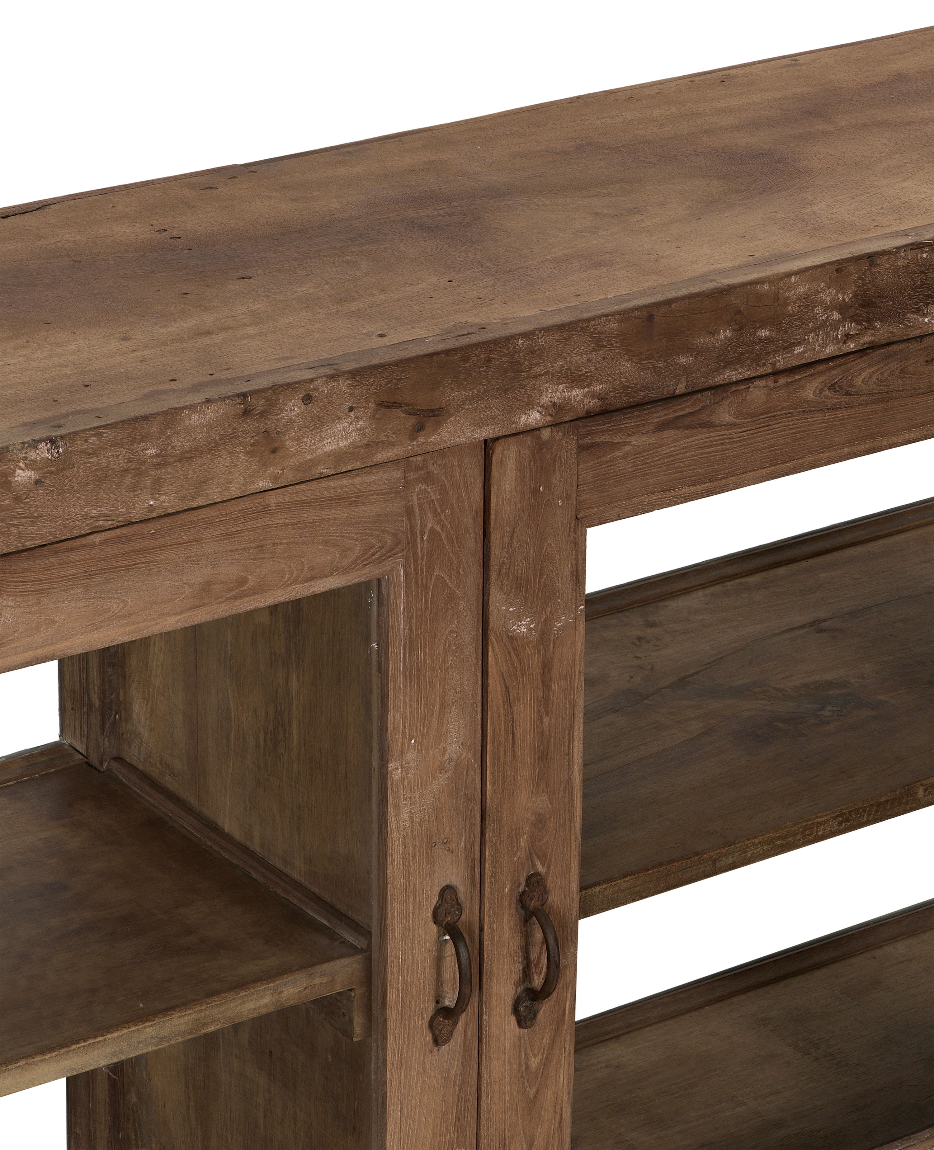 Vintage Indian oak sideboard's distressed natural wood top and metal handles.