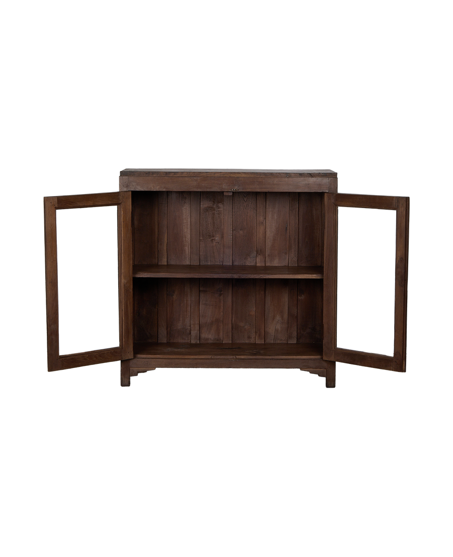 Vintage Indian oak cabinet displaying interior shelving and open glass-front doors.