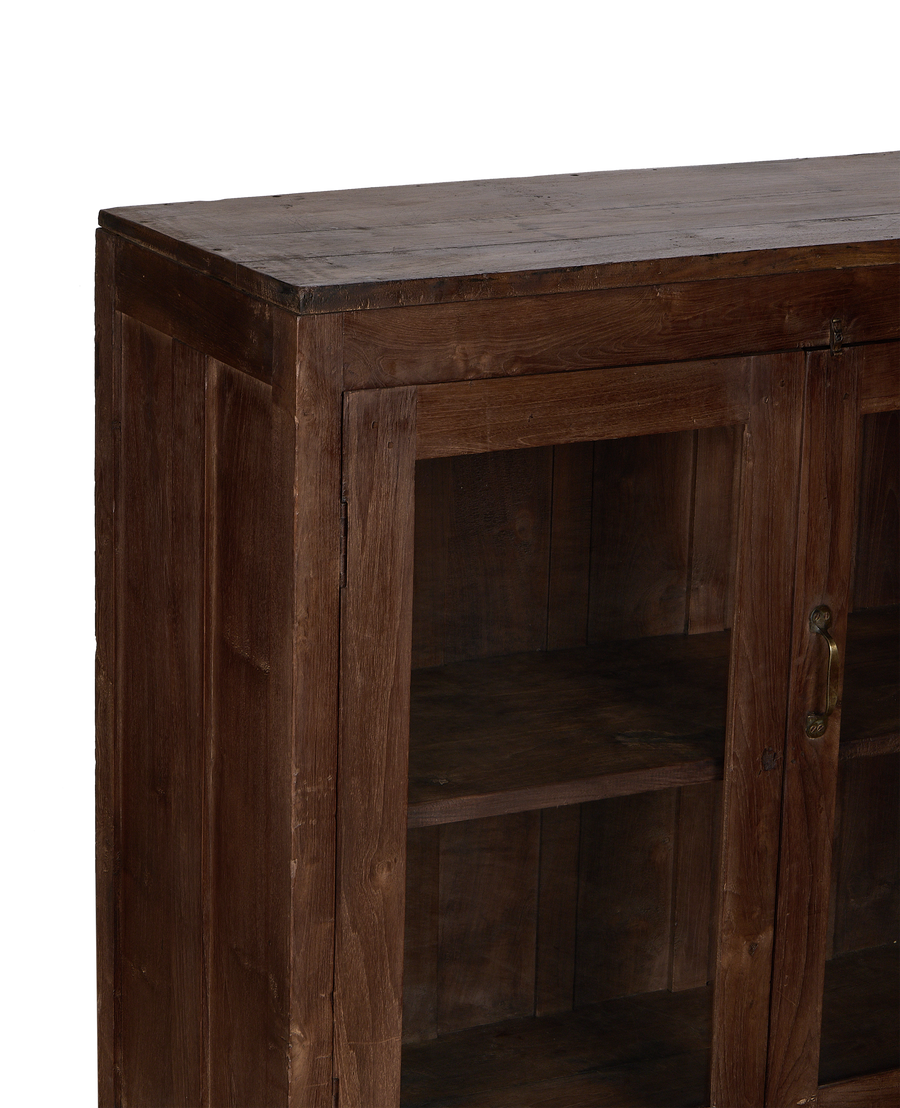 Vintage Indian oak wood cabinet, close-up of natural wood grain on top surface.