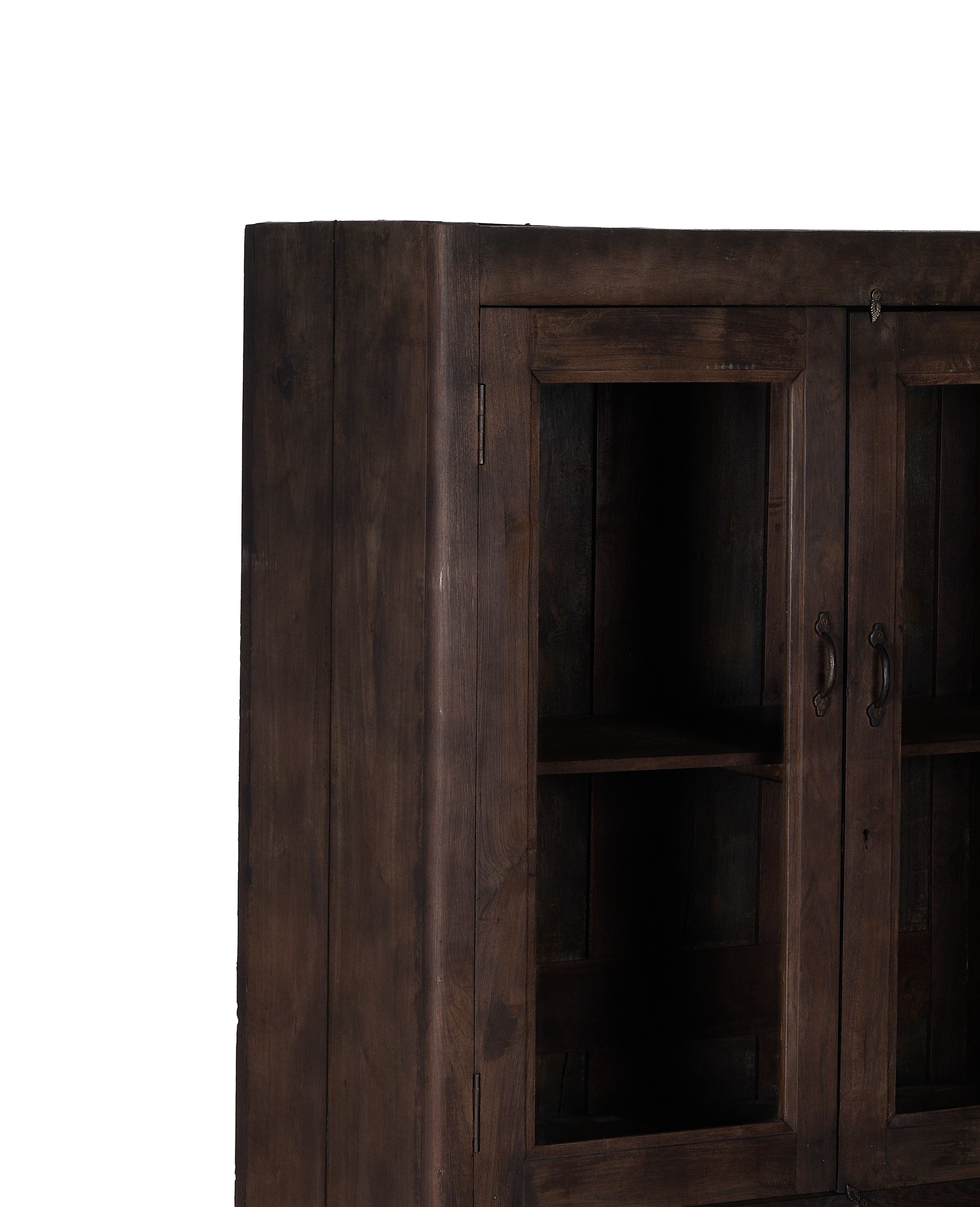 Stained oak vintage Indian wood cabinet, showing side profile and glass door detail.