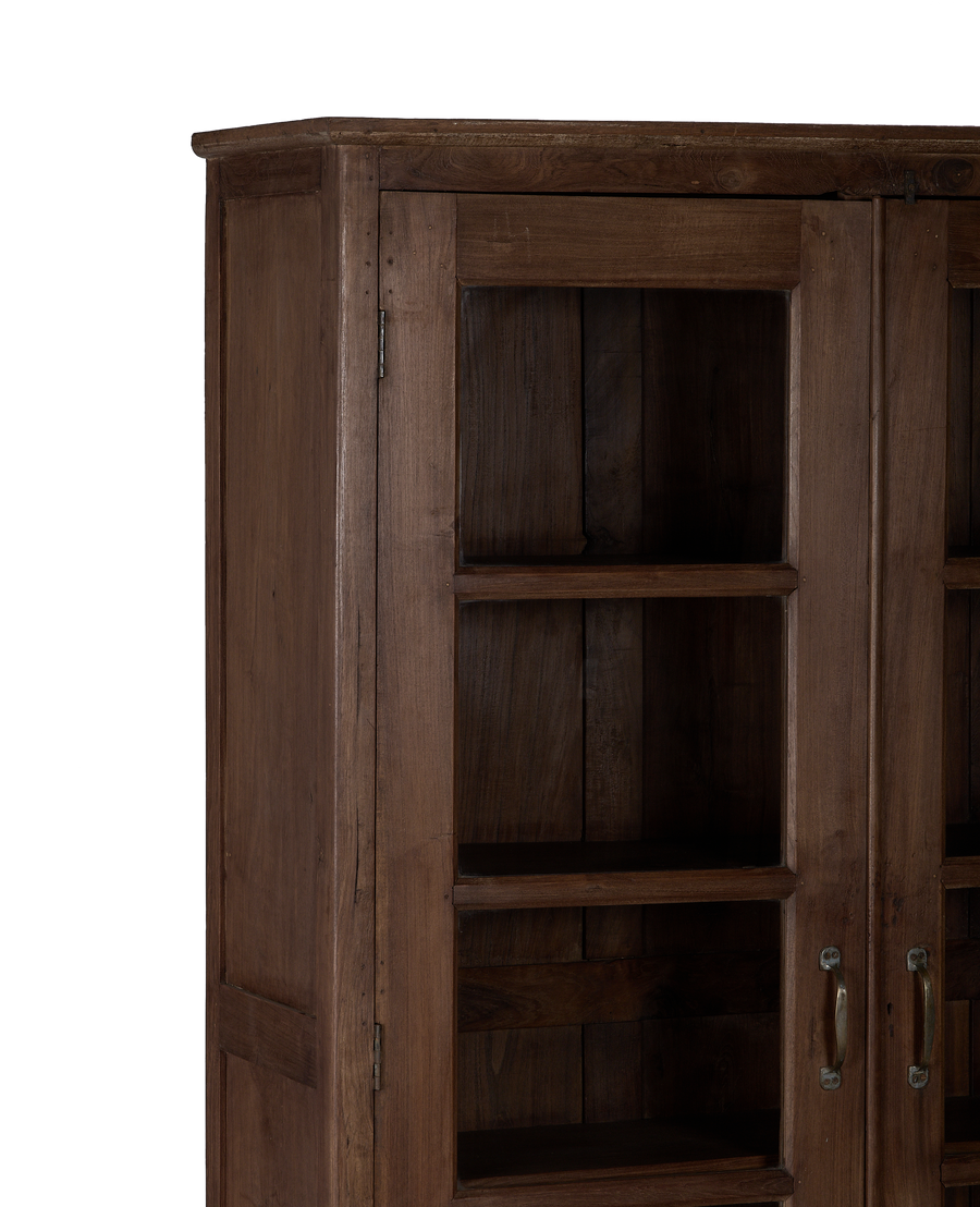 Vintage oak Indian cabinet, close-up shows beautiful wood grain and rustic metal hinges.
