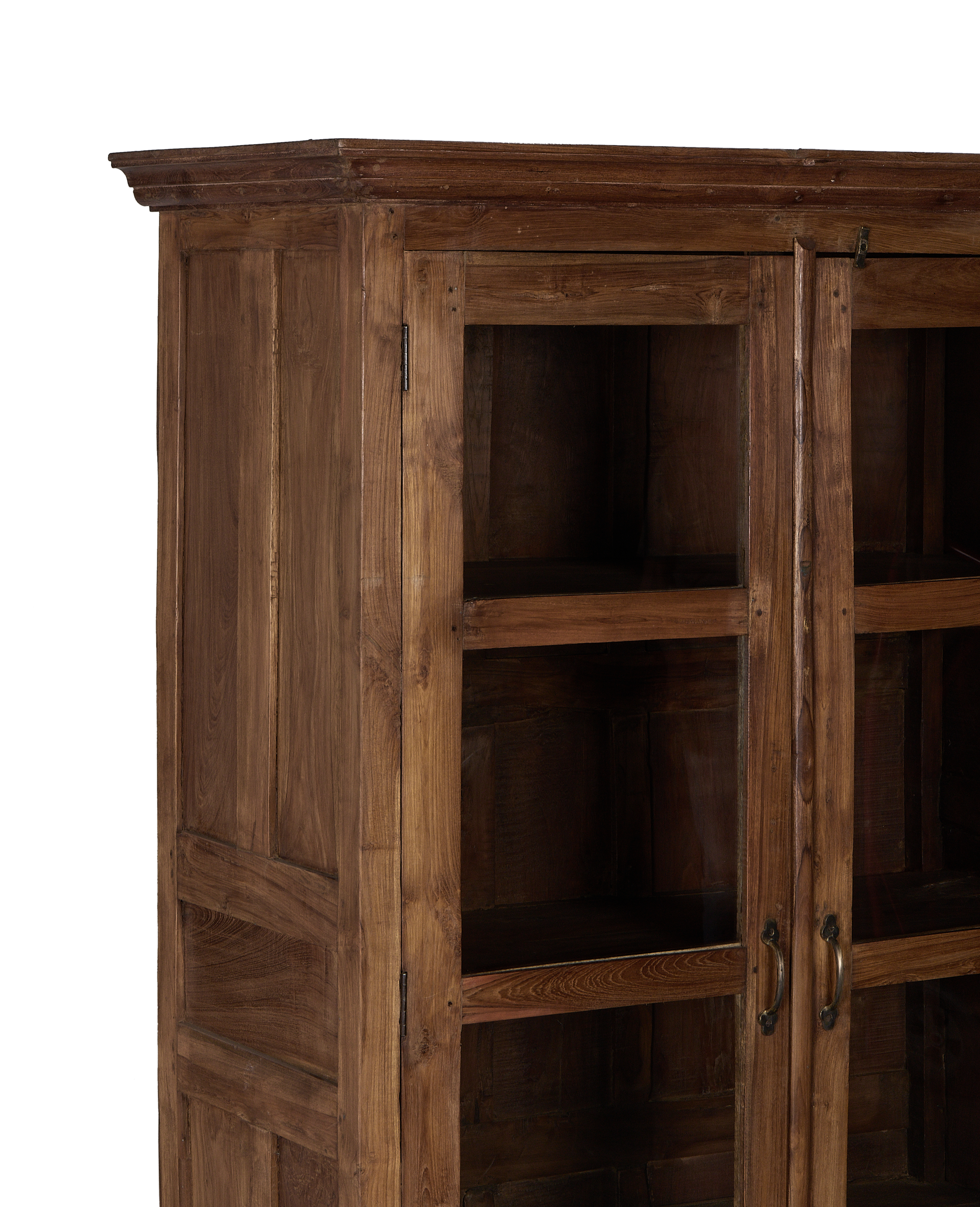 Vintage Indian oak cabinet: detailed top molding and glass door panel craftsmanship.