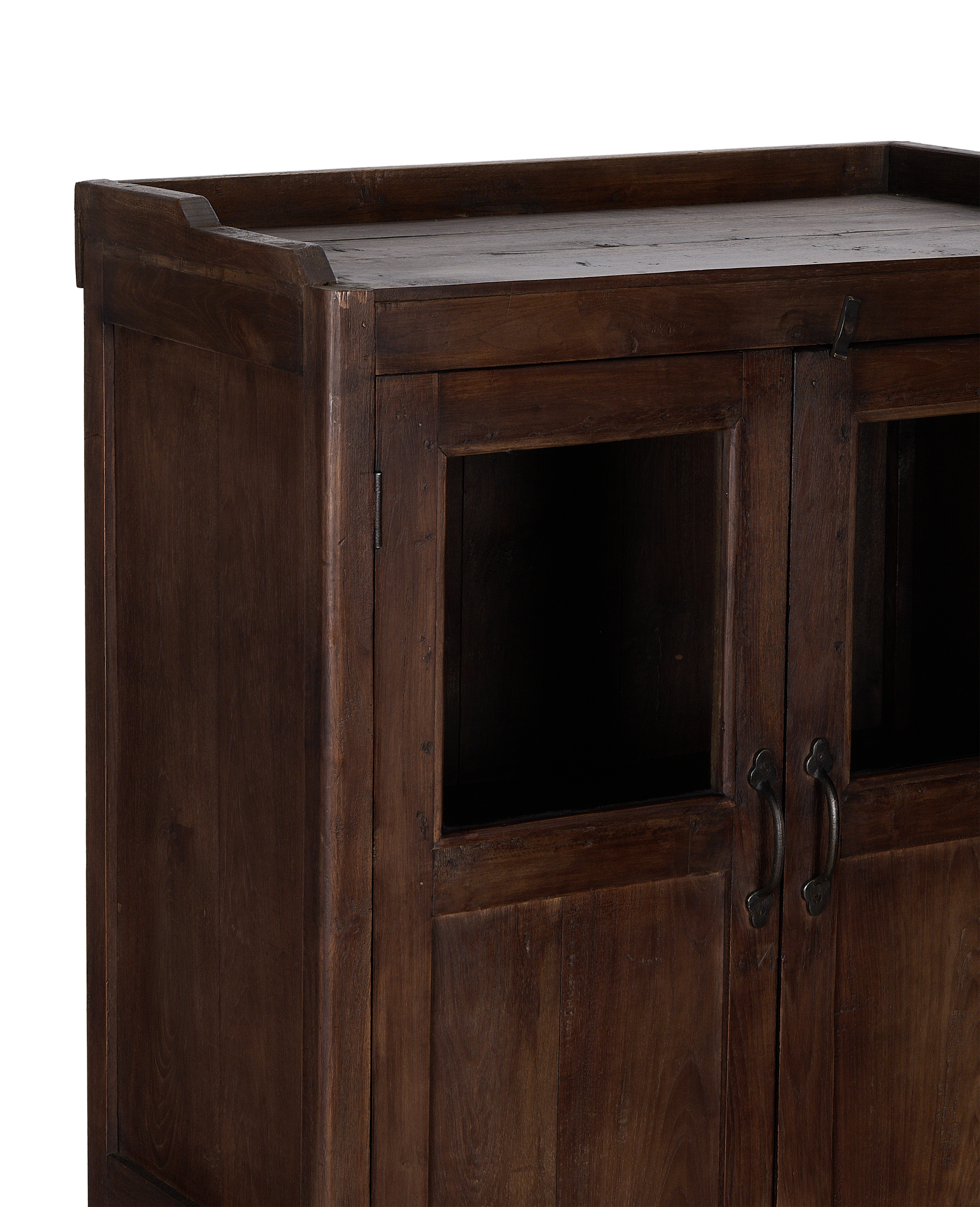 Vintage Indian oak cabinet details, showing rich natural wood grain and rustic metal latch.