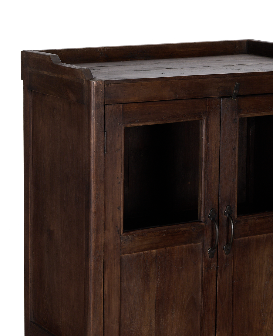 Vintage Indian oak cabinet details, showing rich natural wood grain and rustic metal latch.