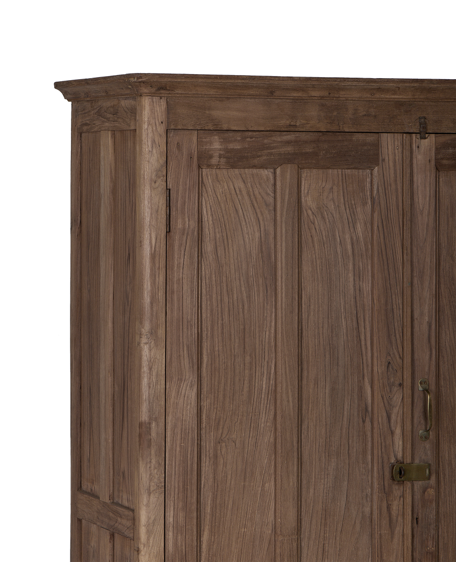 Vintage Indian oak cabinet details: natural wood grain, ornate top trim, and brass handle.
