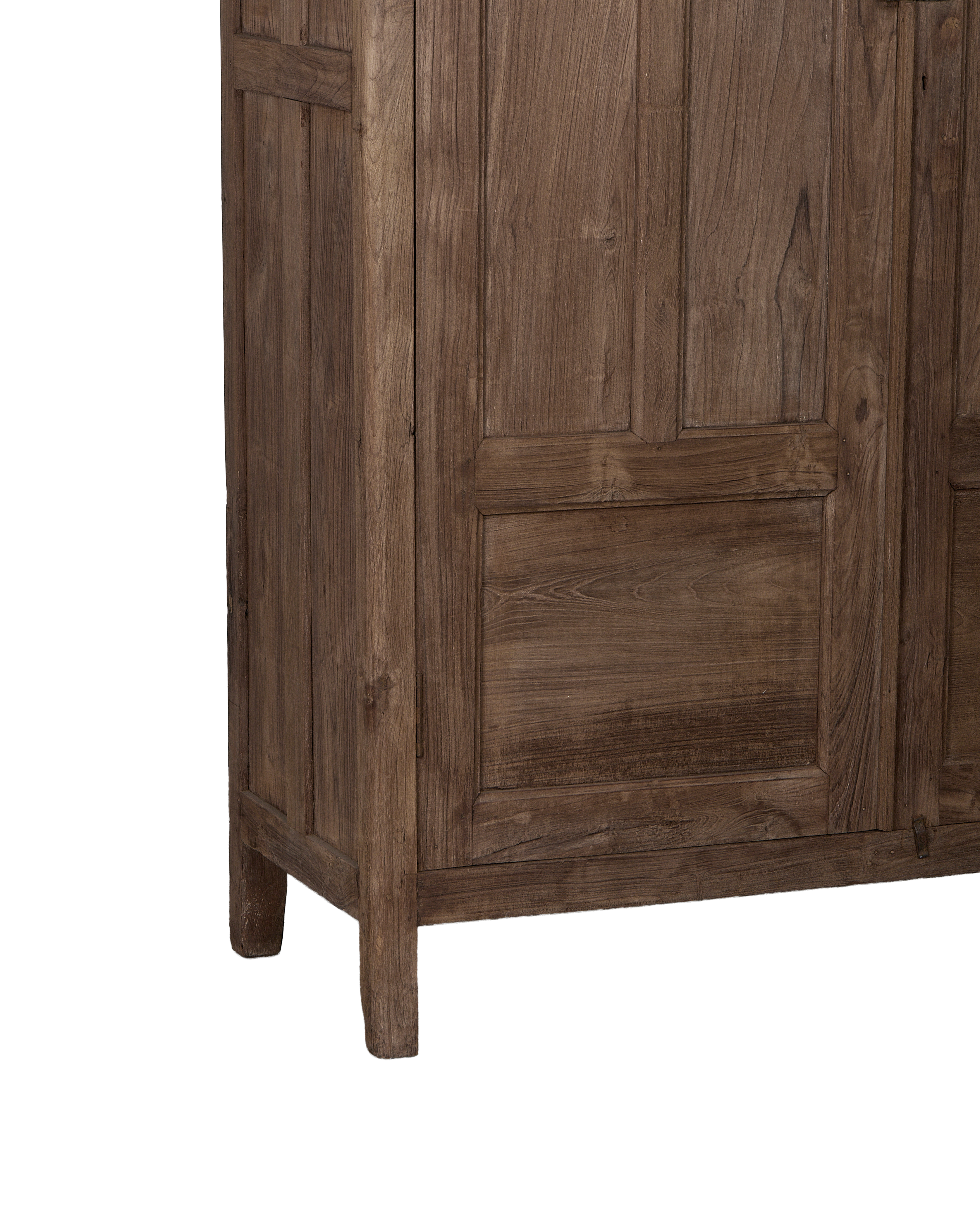 Vintage Indian oak cabinet, showing intricate paneling, natural wood grain, and sturdy leg details.