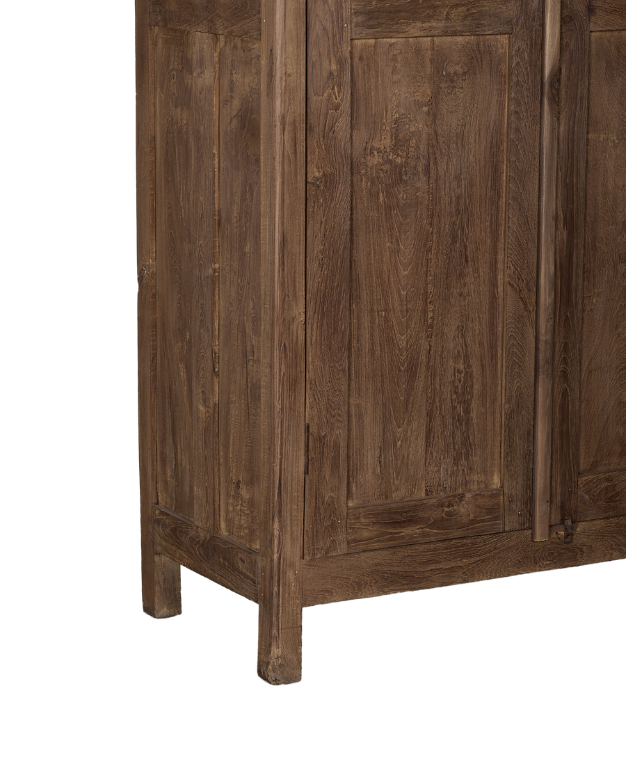 Vintage oak cabinet, India, showing sturdy wood leg and panel construction.