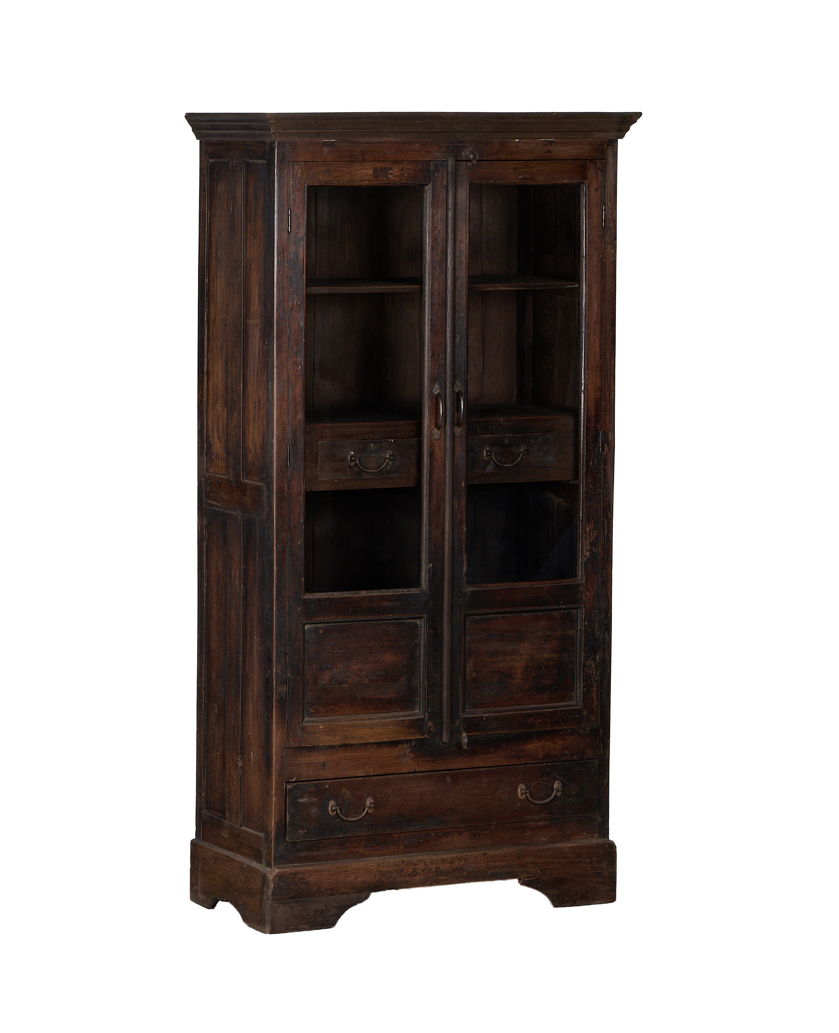 Vintage Indian stained oak cabinet, detailed view of glass doors, shelves, and lower drawers.