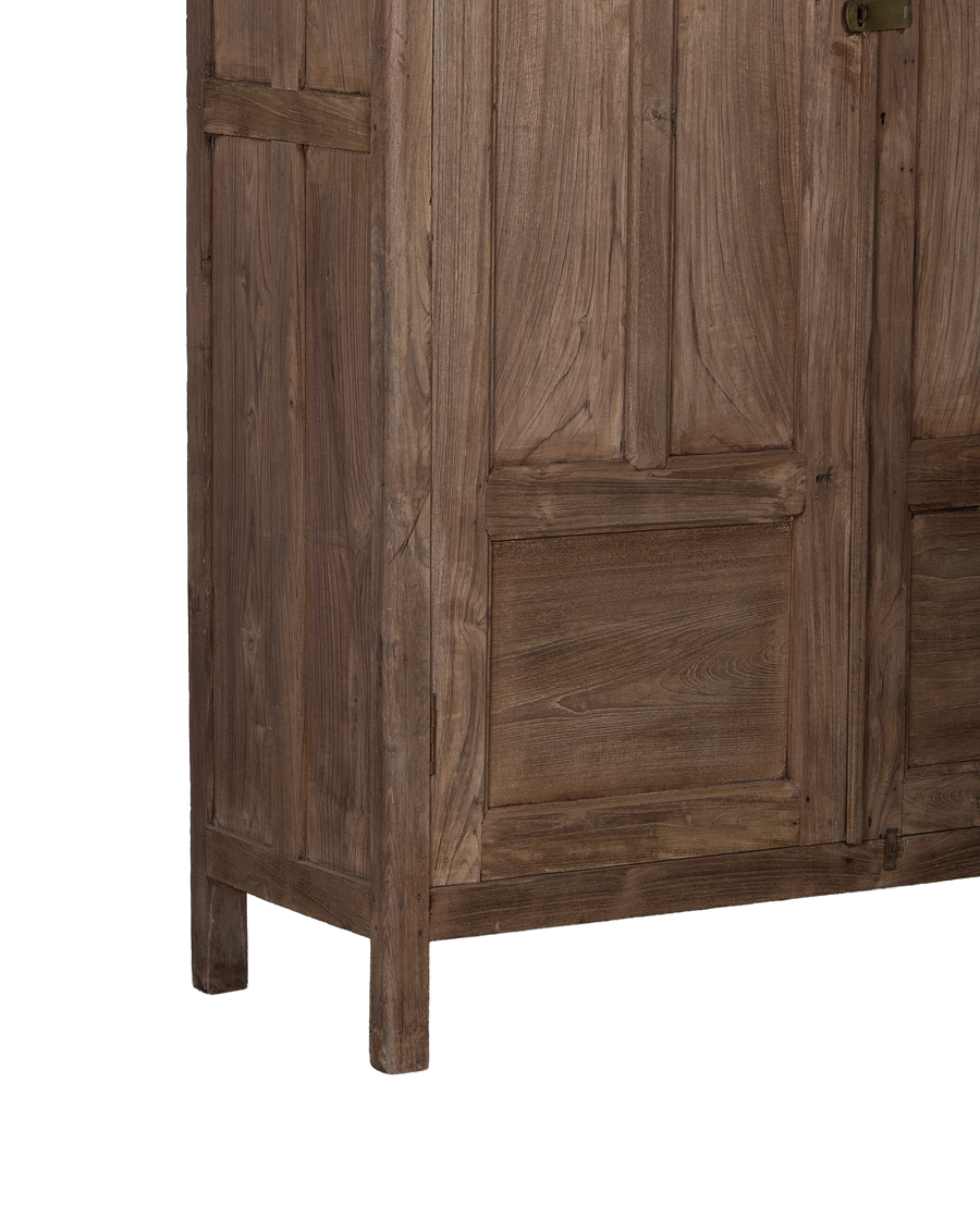 Vintage Indian oak cabinet: detailed close-up of natural wood grain and joinery on vintage furniture.