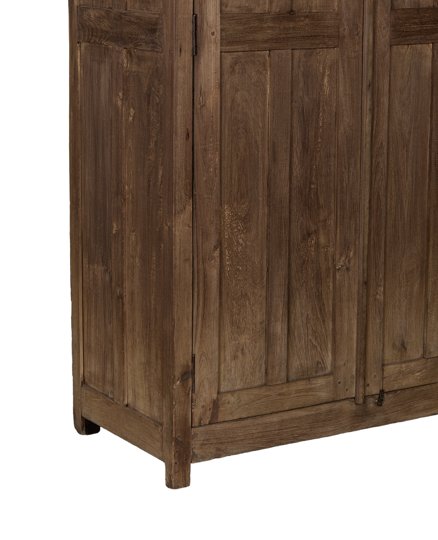 Vintage Indian wood cabinet, showing side profile, natural oak grain.