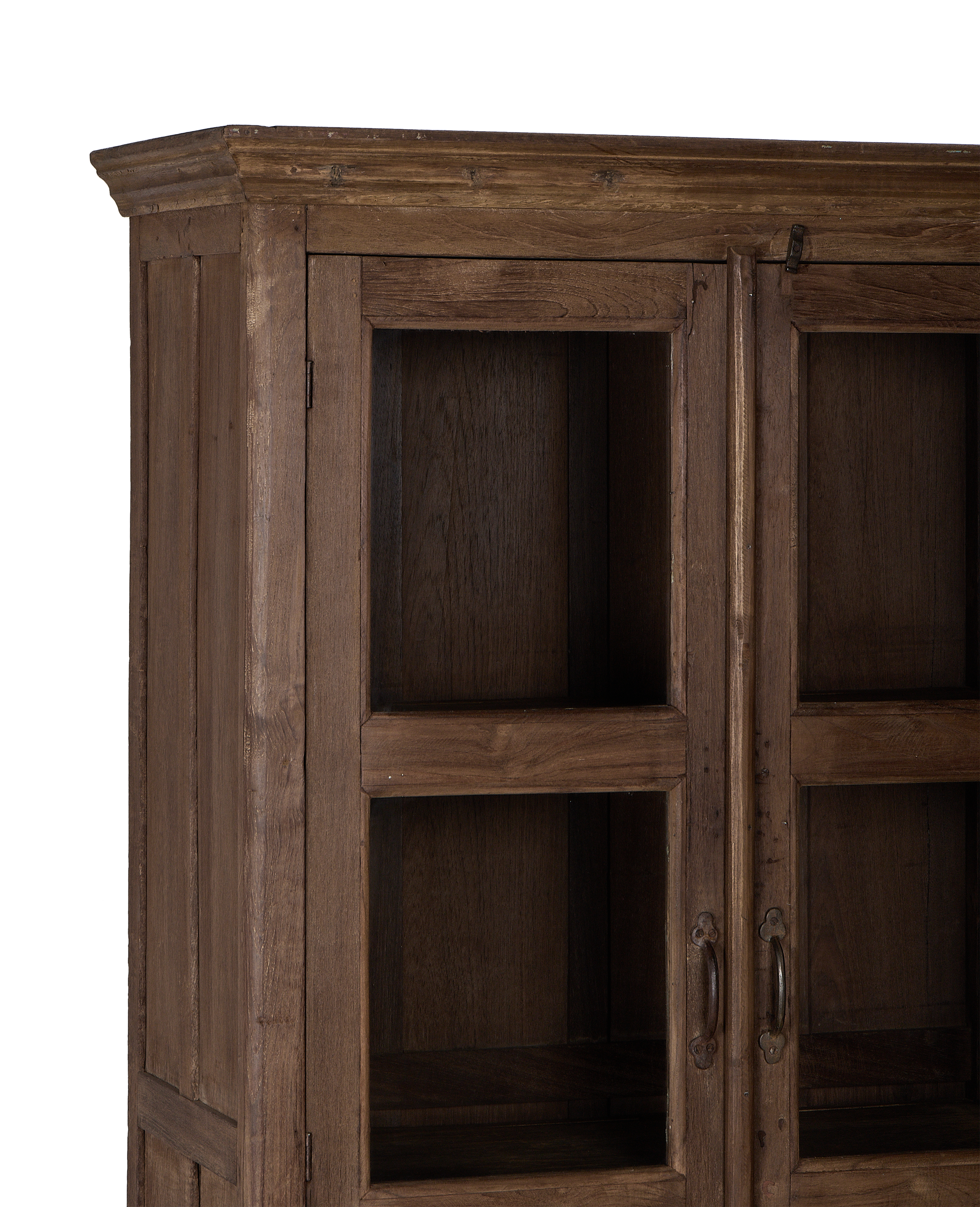 Vintage Indian oak cabinet: detailed close-up of natural wood grain and glass doors.