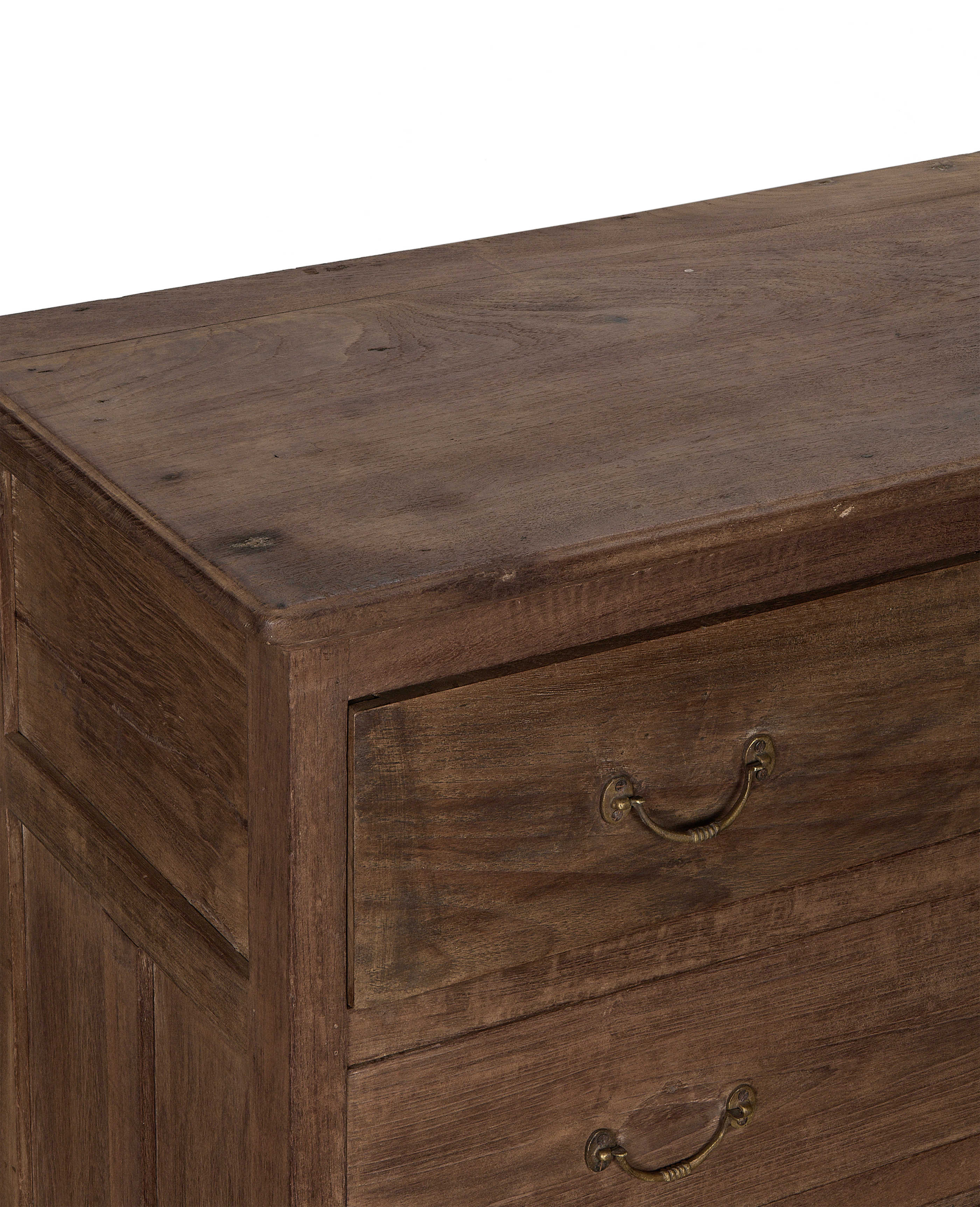 Vintage oak dresser, angled close-up revealing natural wood grain, ornate brass handle.